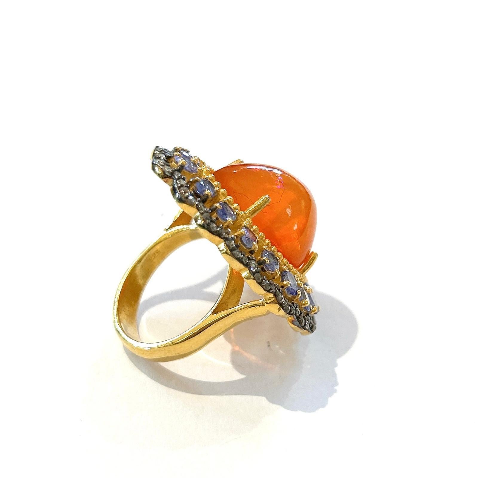 Bochic “Orient” Opal, Sapphire & Multi Gem Cocktail Ring Set 18K & Silver 

Natural Orange Opal  - 7.50  carats 
Natural White Topaz -  2 carats
Natural Blue Sapphire  - 4 carats 
Natural Gray Diamonds - 1 carat 

This Ring is from the 