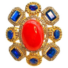 Anillo Bochic "Orient" de ópalo naranja, cianita y diamantes engastado en oro de 18 quilates y plata