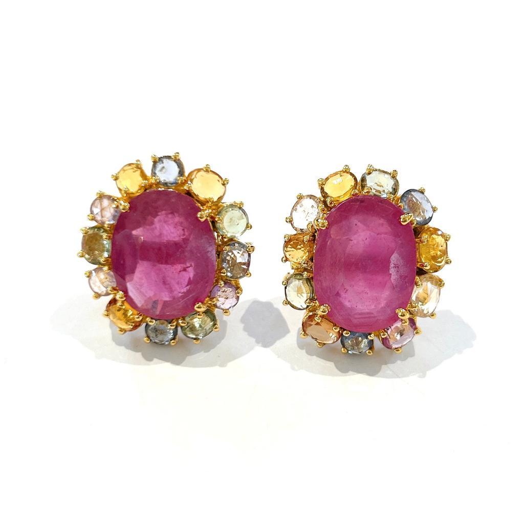 Bochic “Orient” Pastel Sapphires  & Red Rubies Earrings Set In 18K Gold & Silver 

Red Oval Shape Rubies - 17 Carats 
Pinkish Pastel Multi Color Sapphires  - 7 Carats 
Rose cuts. 


The earrings from the 