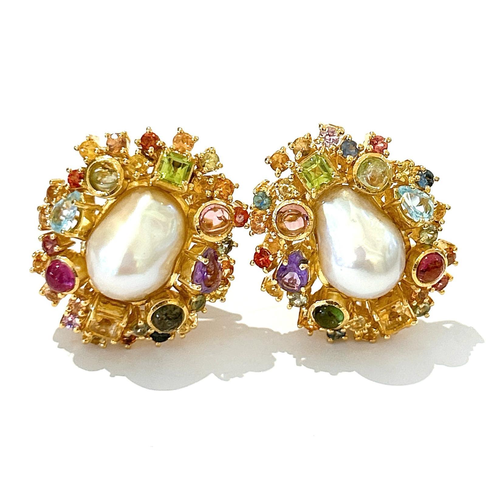 Bochic “Orient” Pearl, Ruby, Sapphire & Multi Gem Earrings Set 18K Gold&Silver 

Natural Emeralds - 0.40 carat
Natural Amethyst - 3 carat 
Natural Multi Sapphires - 2 carat
Natural Red Garnet - 1.50 carat 


The earrings from the 