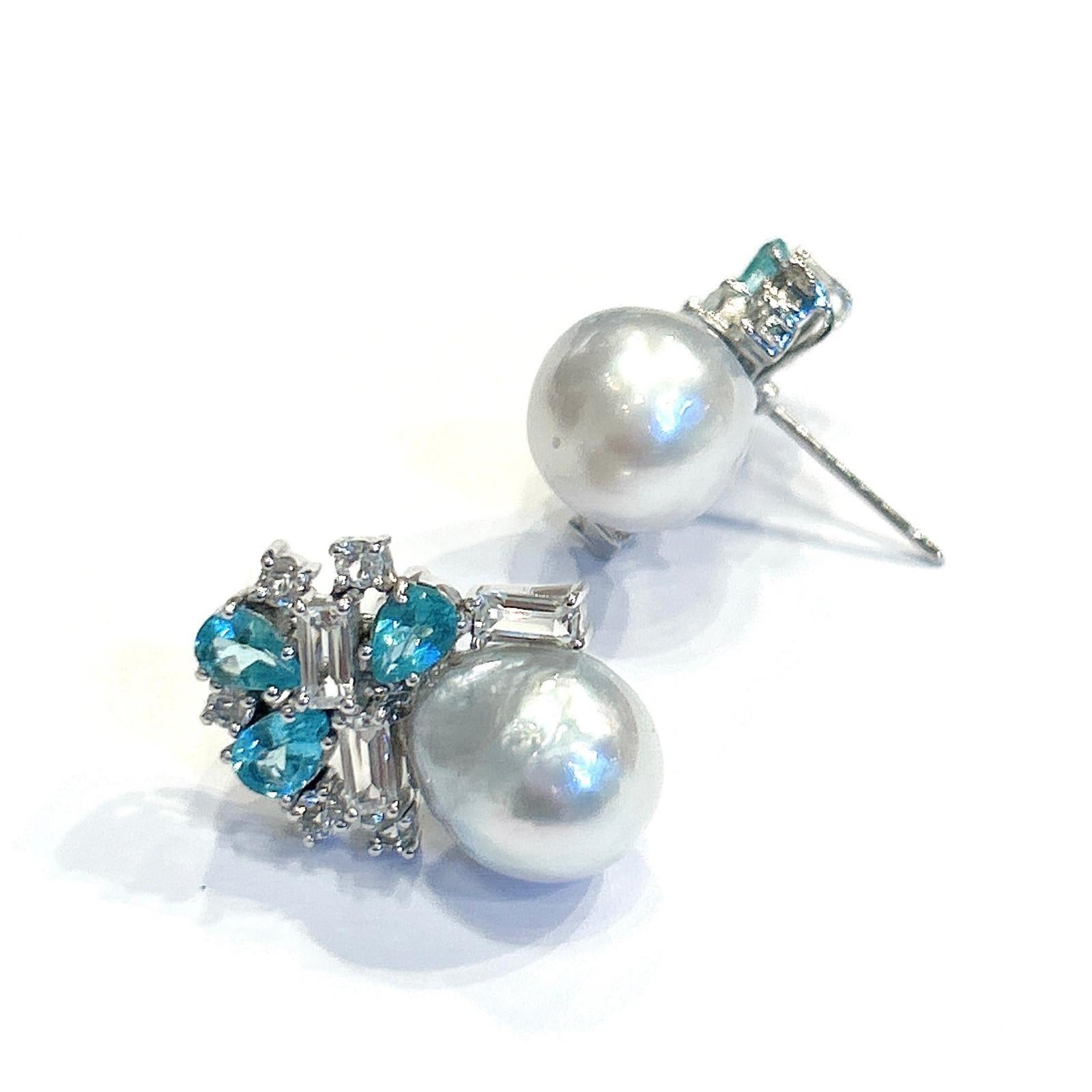 Bochic “Orient” Pearls, Topaz & Blue Appetite Earrings Set 18K Gold & Silver 

Natural Blue Appetite, Pear Shape  - 4.50 carat
Natural White Topaz, Emerald Shape - 4.00 Carats 
White South Sea Pearls 

The earrings from the 