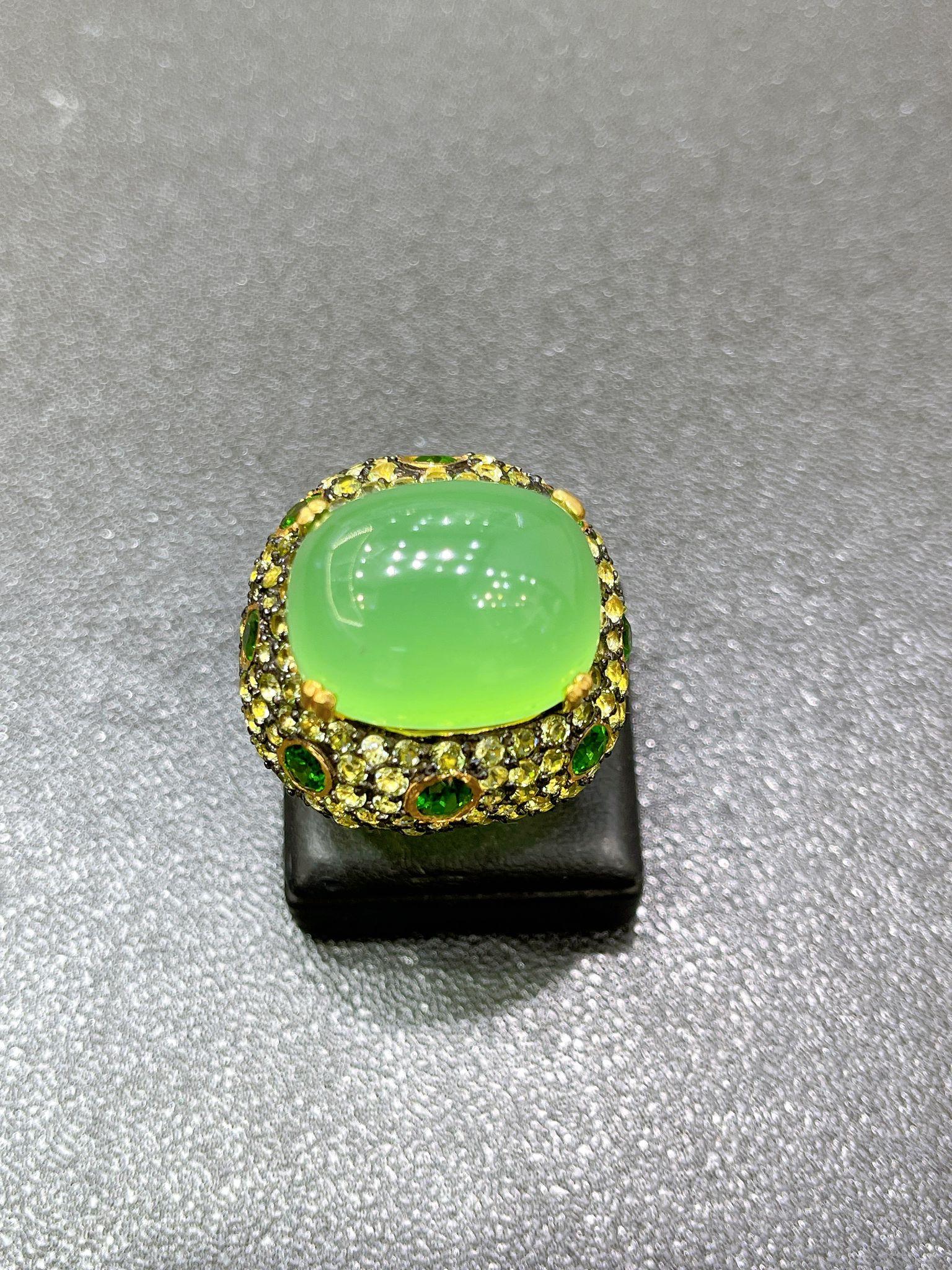 Bochic “Orient” Peridot, Penite & Multi Gems Cocktail Ring 18K Gold & Silver 

Natural Green Penite  - 12 Carat 
Chrome Dioxide - 3 Carat 
Peridot - 2 Carat 

This Ring is from the 