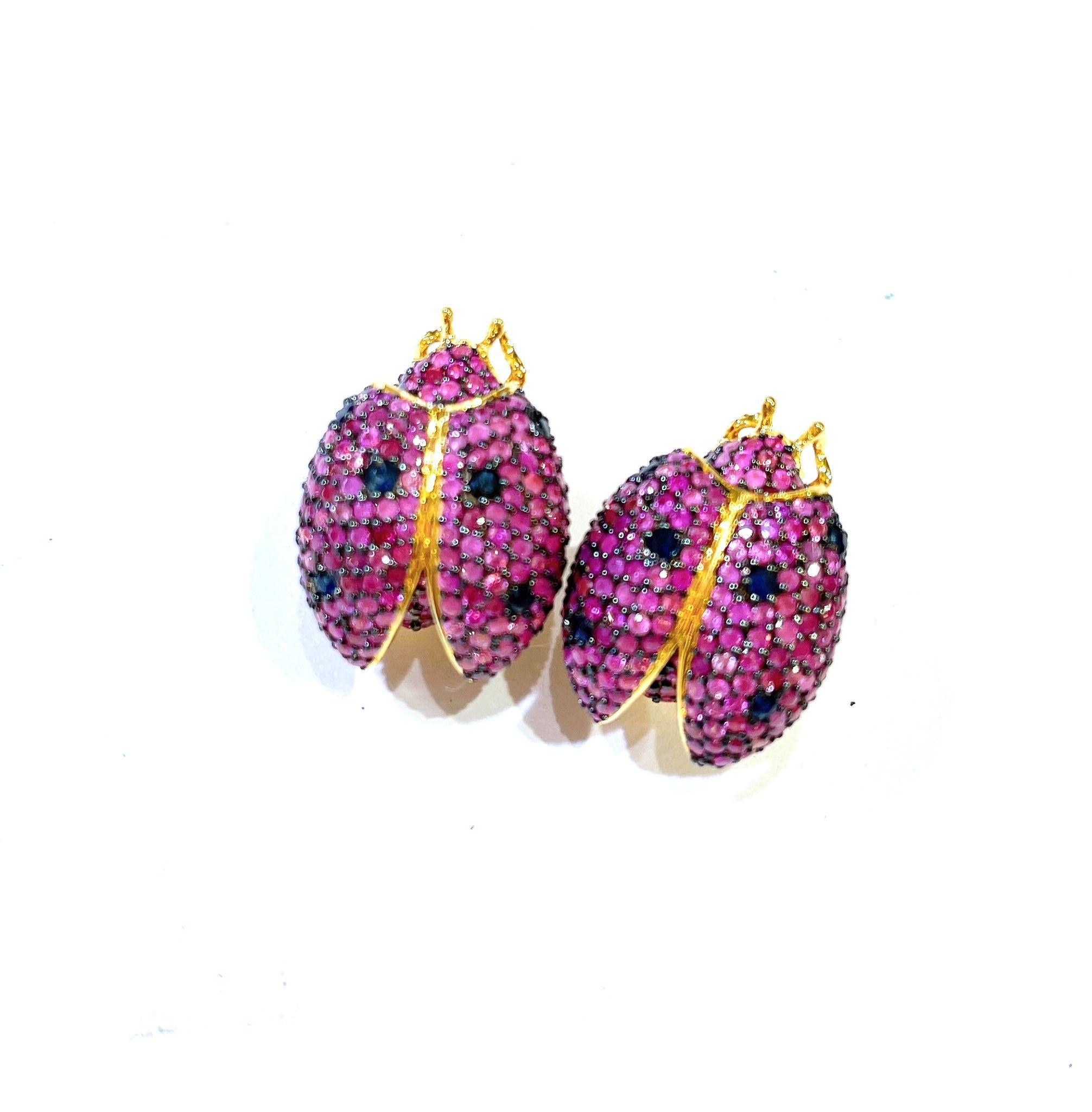 Bochic “Orient” Pink Sapphire & Blue Sapphire Earrings Set In 18K Gold & Silver 

Natural Pink Sapphire  - 3 carat  
Natural Blue sapphire - 0.40 carat 

The earrings from the 
