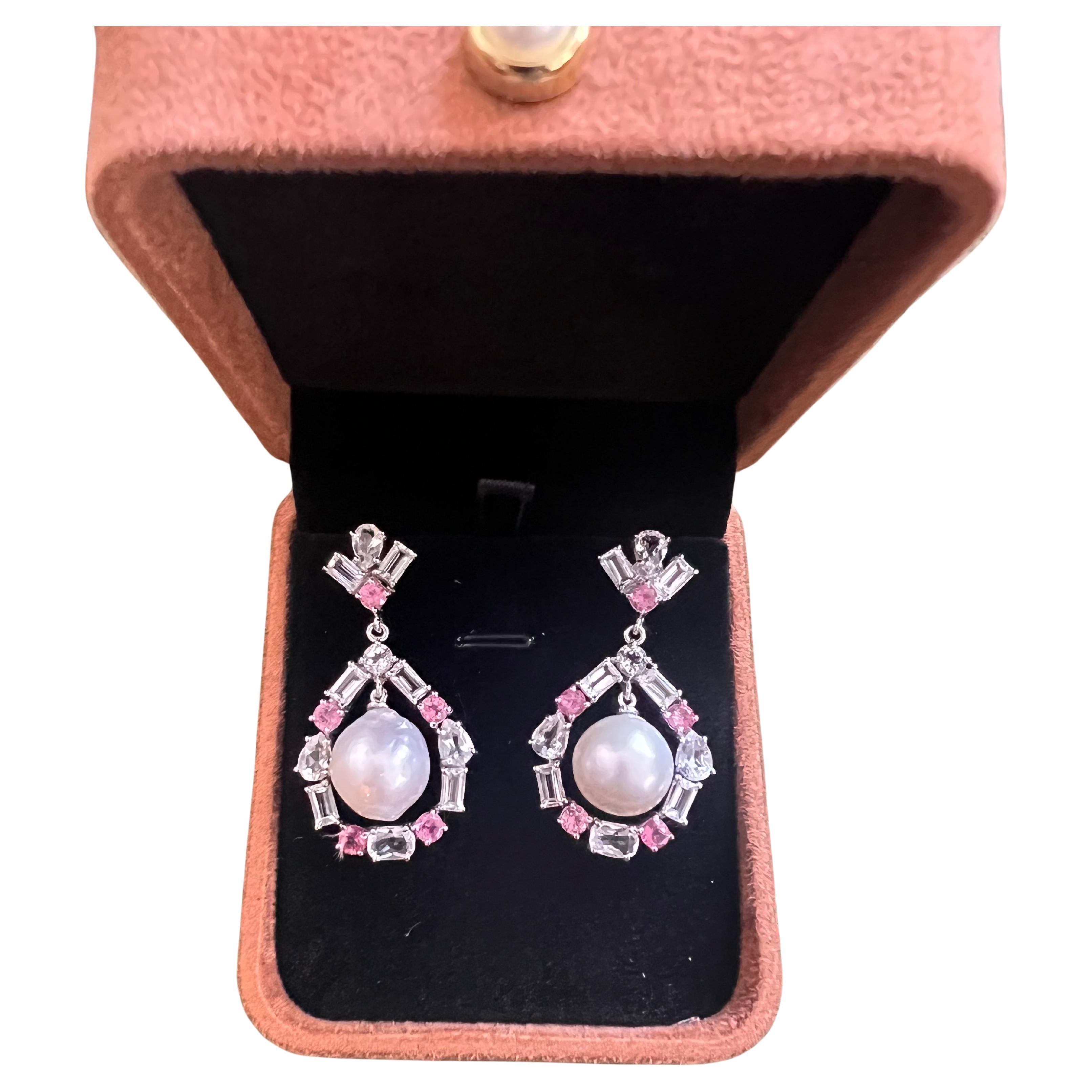 Bochic “Orient” Pink Sapphire & White Pearls Earrings Set 18K Gold & Silver 

Natural Pink Sapphire - 4 carat 
Natural White Topaz - 5.50 carat 
Baroque white south sea pearls 

The earrings from the 