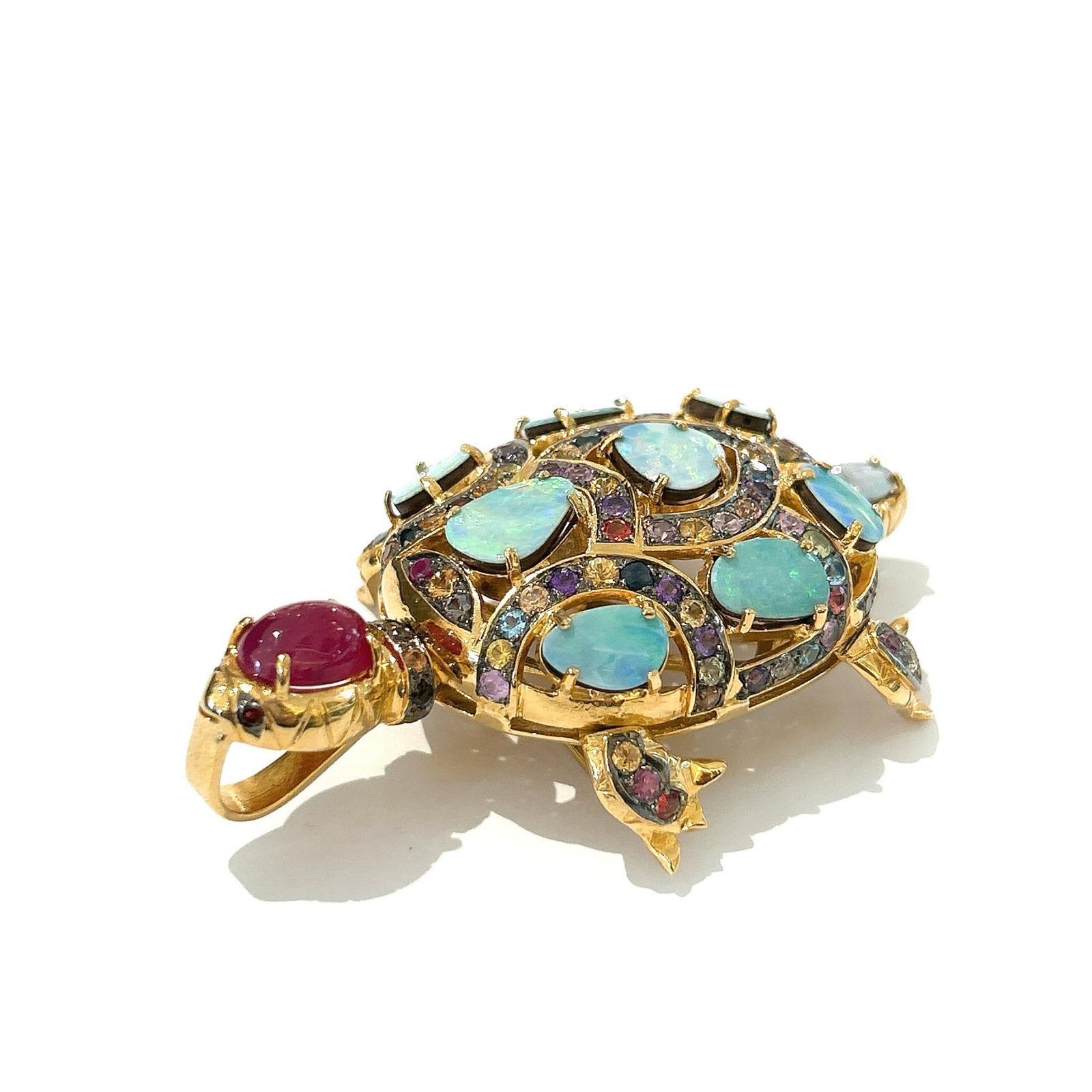Bochic “Orient” Retro Multi Sapphires & Opal Brooch Set In 18K Gold & Silver 

Can be worn as a brooch and a pendant 

Blue color Natural Sapphires from Sri Lanka 
7 carat
Multi color Natural Ruby from Sri Lanka 2 carat 
Blue Opals 
9 carat 


The