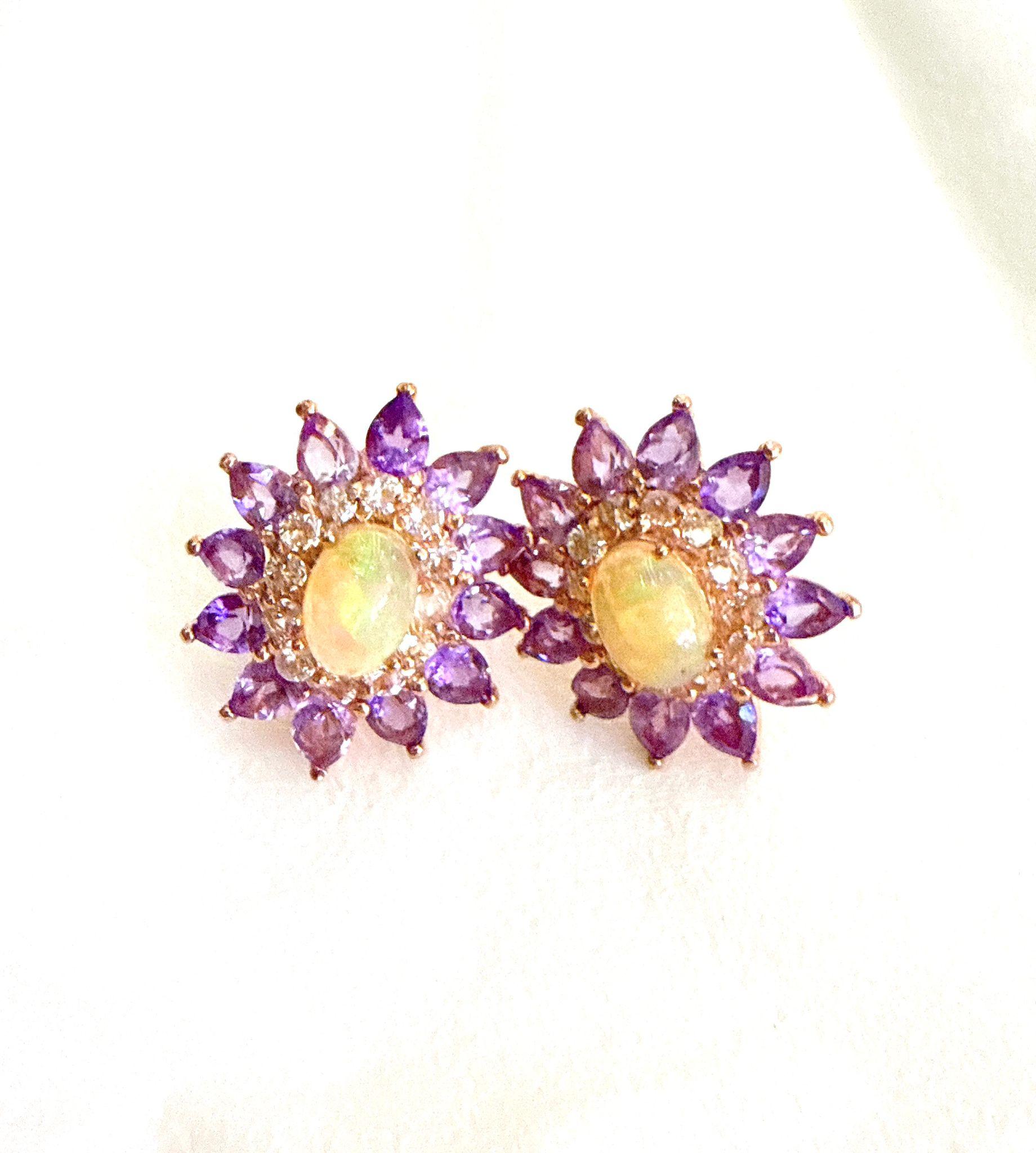 Bochic “Orient” Retro Opal, Topaz & Amethyst Earrings Set In 18K Gold & Silver 

Natural Purple Amethyst, Pear shapes - 7 carat  
Natural Honey Opal, Cabochon shape - 3 carat
Natural White Topaz, Round shapes  - 2,50 carat  

The earrings from the
