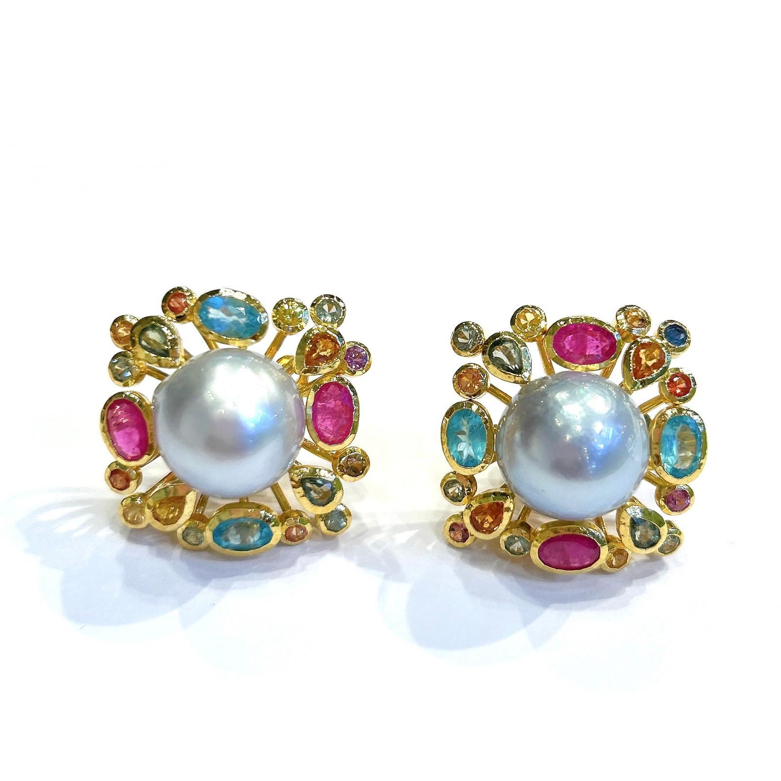 Bochic “Orient” Retro Pearl, Ruby & Multi Gem Burst Earrings Set In 18K Gold & Silver 

Natural Fancy Color Sapphires 
2 carat 
Natural Rubies 
3 carat 
Natural Multi Gems, Blue Topaz, Green Amethyst
2 carat 
South Sea Pearls 

The earrings from the
