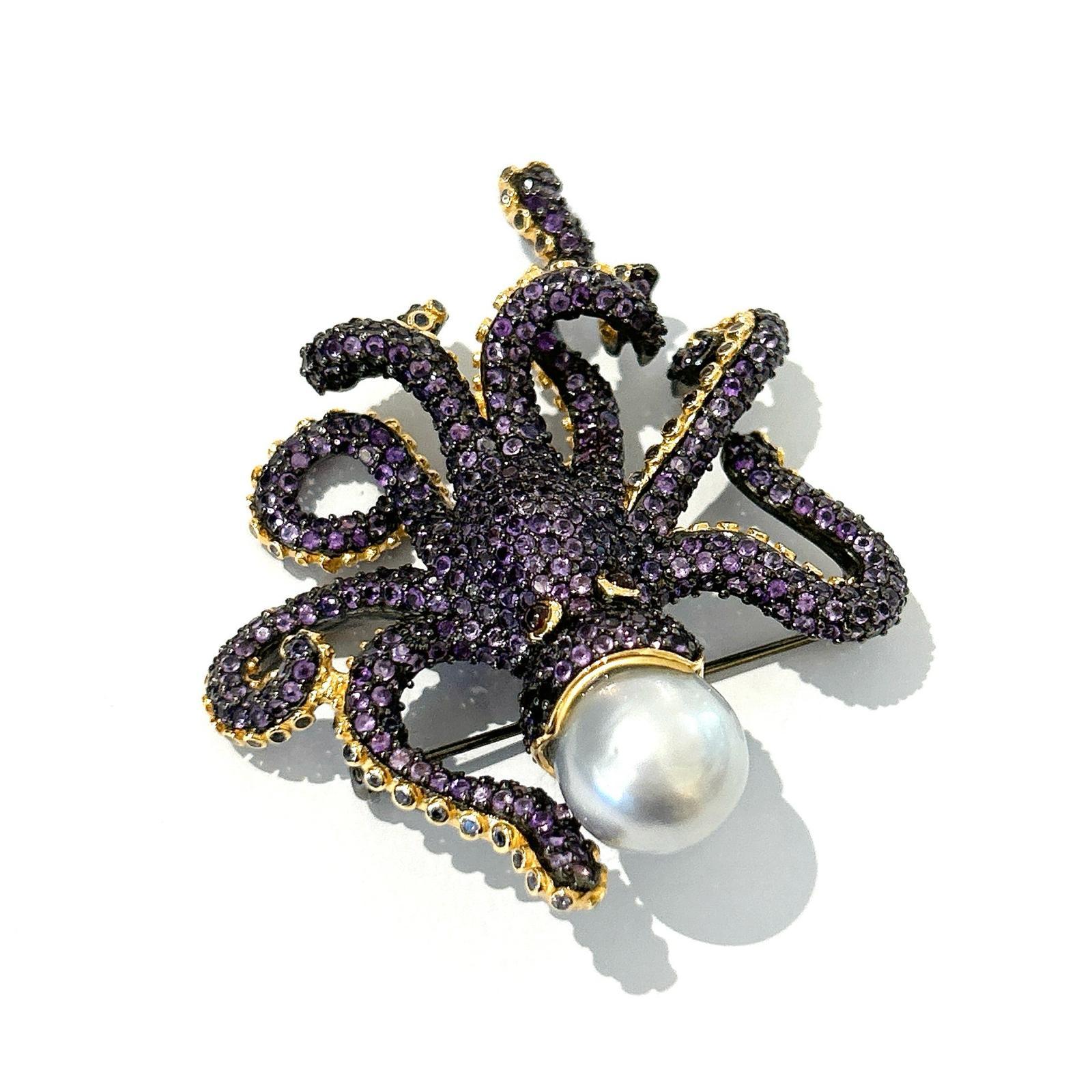 Bochic “Orient” Retro Pink, Purple Amethyst  & Pearl BroochIn 18K Gold & Silver 

Can be worn as a brooch and a pendant 

Pink color Natural Amethyst  from Sri Lanka 
7 carat
Multi color Natural Sapphires from Sri Lanka 
South Sea White Pearl with