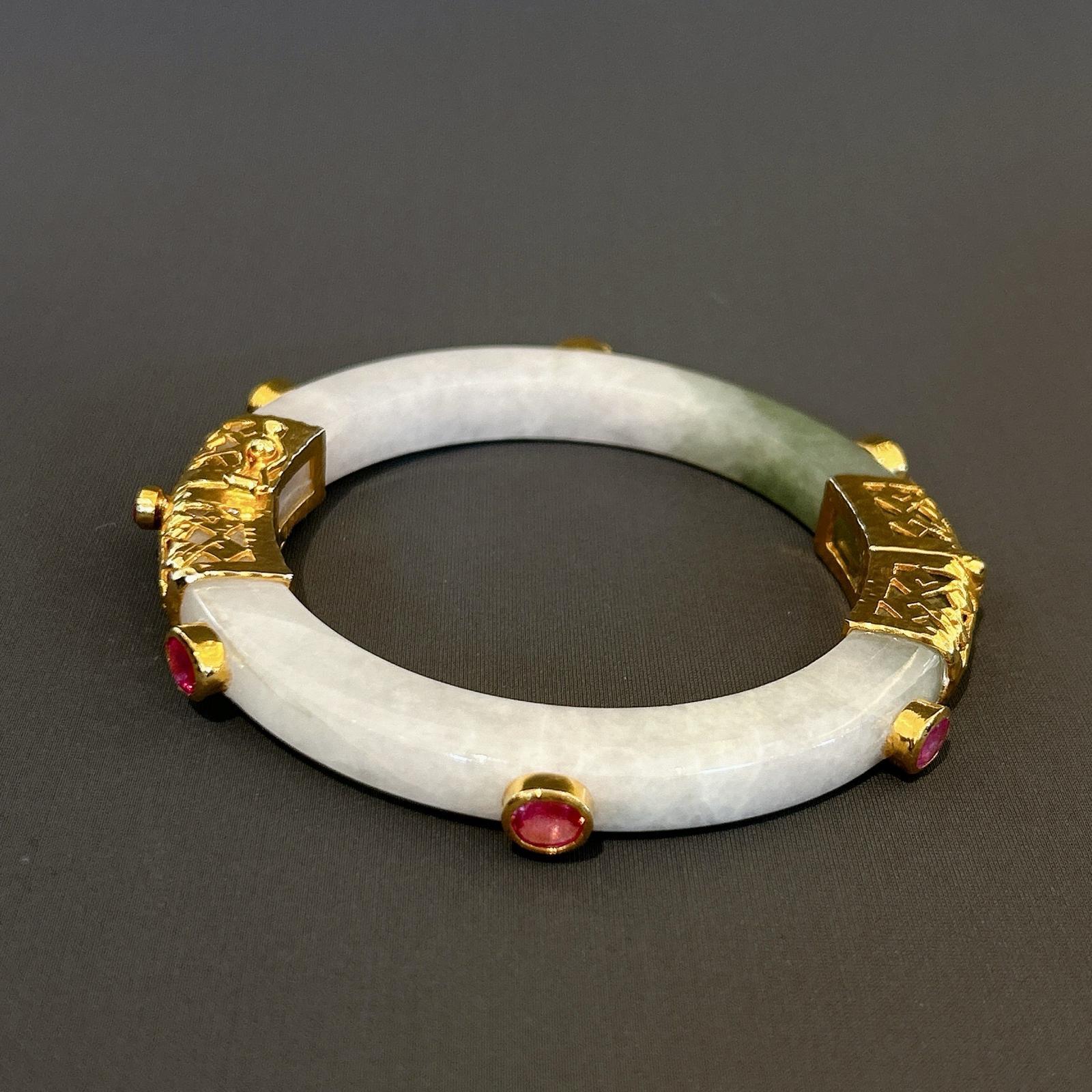 Bochic “Orient” Ruby & Vintage Jade Bangle Set In 18K Gold & Silver 

Natural red rubies - 4 Carats 
Vintage Mint Green Jade 

The bangle has an open and close hinge 

This bangle is from the 