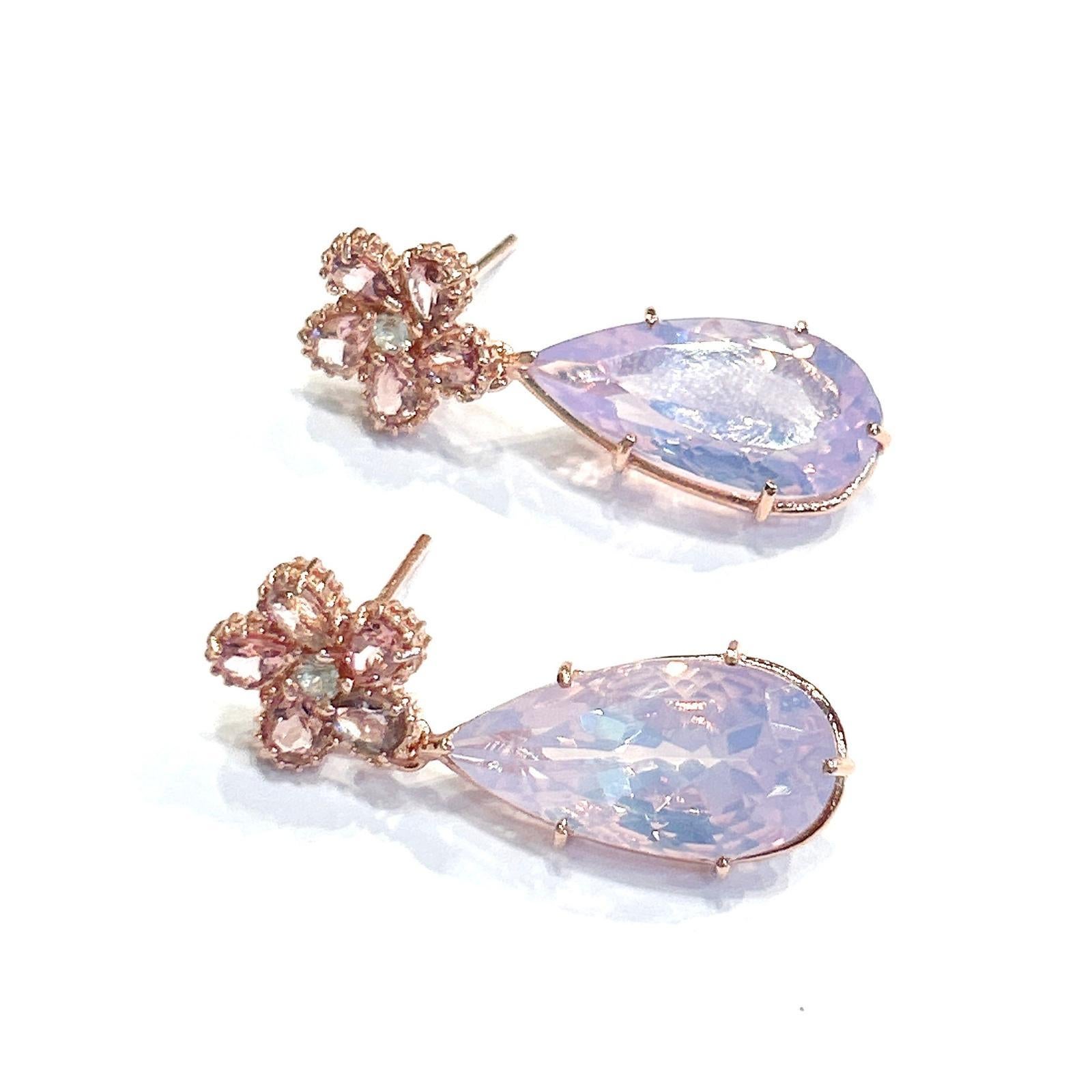 Bochic “Orient” Rose Rodorite & Pink Quartz  Earrings Set In18K Gold & Silver 

Natural Rose Rodorite, Pear Shape  - 2.50 carat 
Natural Pink Quartz , Pear Shape  - 12.50 carat
Natural White Topaz - 1.00 Carats 

The earrings from the 