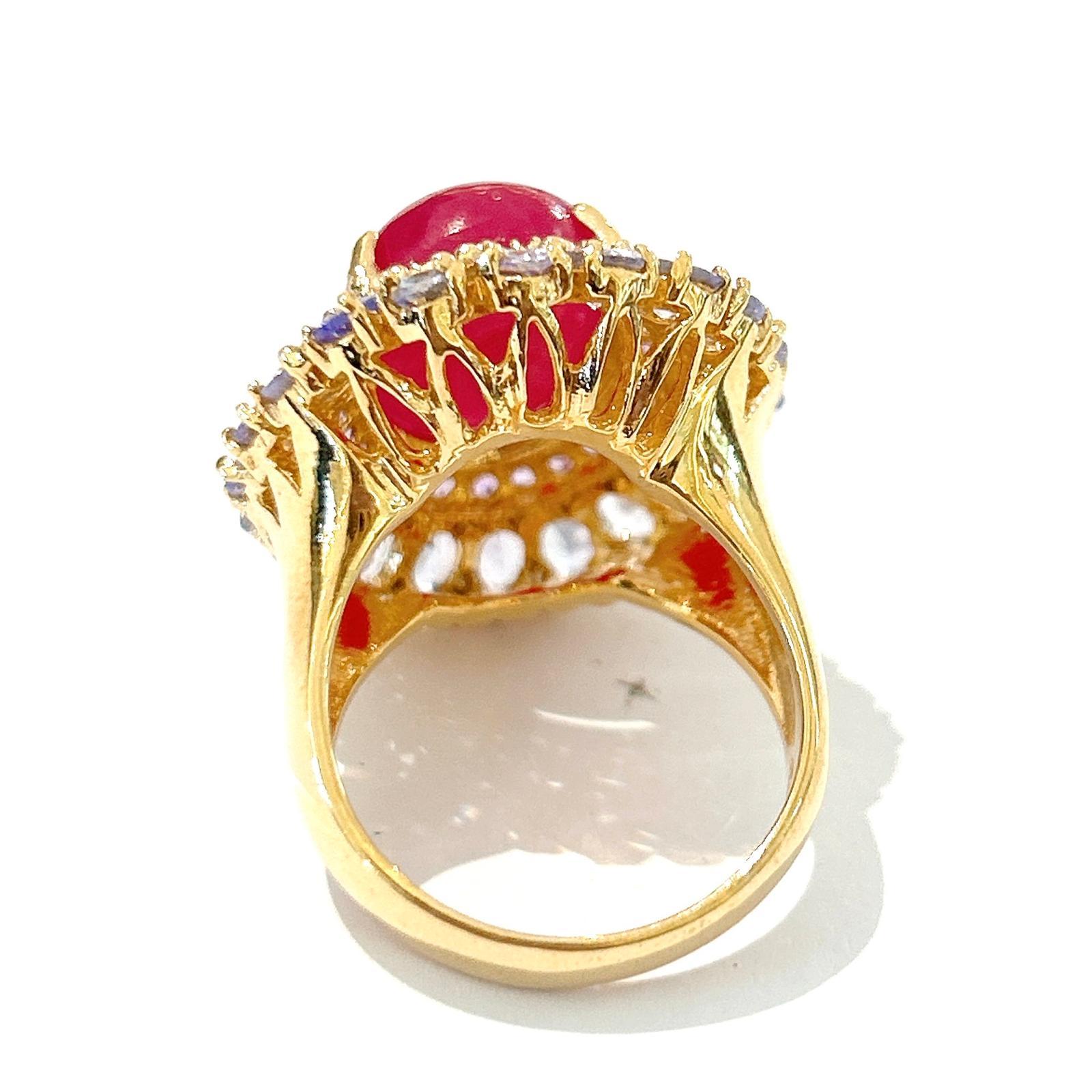 Bochic “Orient” Ruby, Amethyst & Multi Gem Cocktail ring  In 18K Gold & Silver 

Natural Red Ruby Cabochon - 7 Carat 
Natural Amethyst - 4 Carat 
Natural Tanzanite - 5 Carat 
Natural White Topaz - 2 Carat 

This Ring is from the 