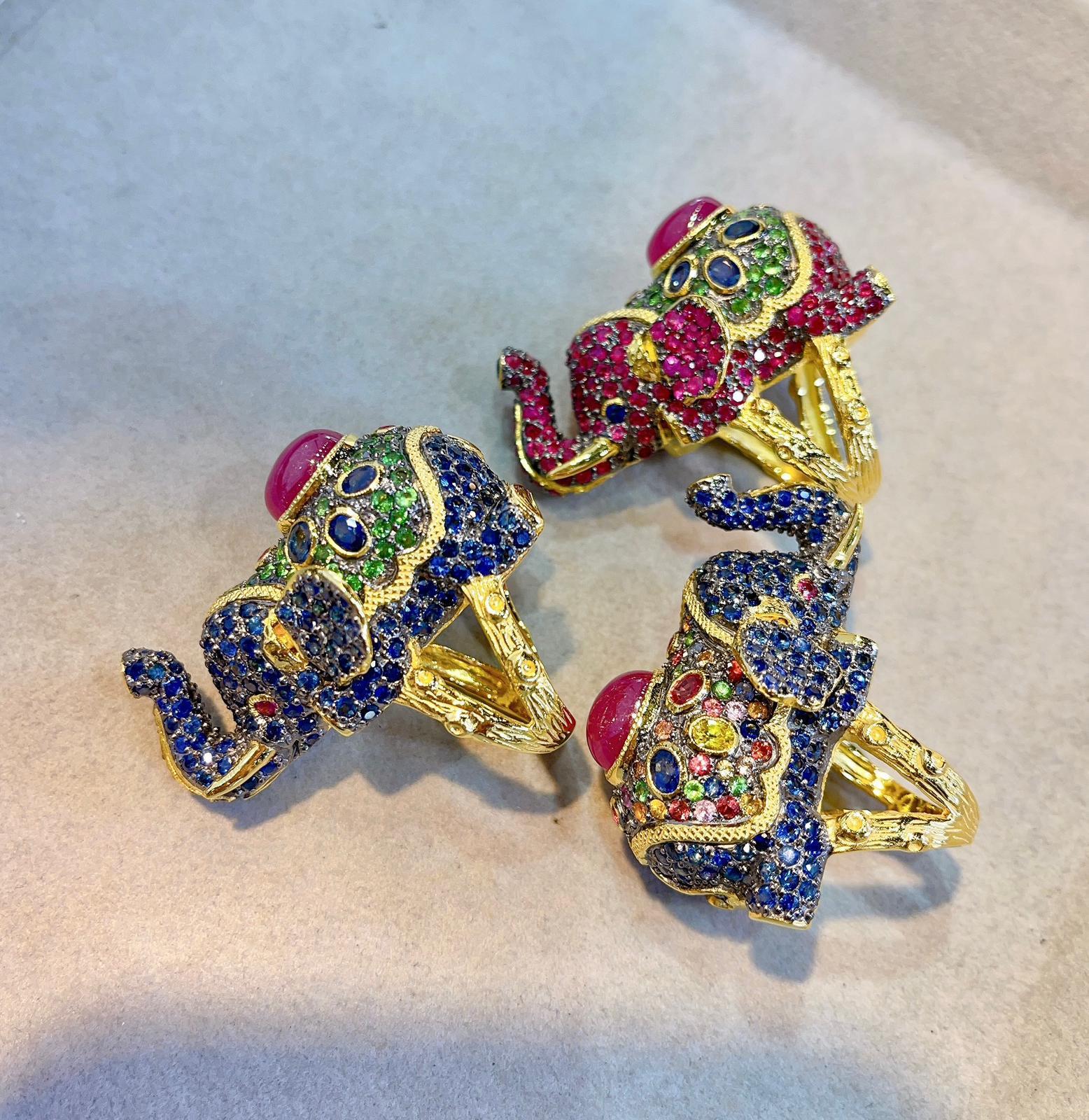British Colonial Bochic “Orient” Ruby, Emerald & Sapphire Elephant Rings Set in 22k Gold & Silver For Sale
