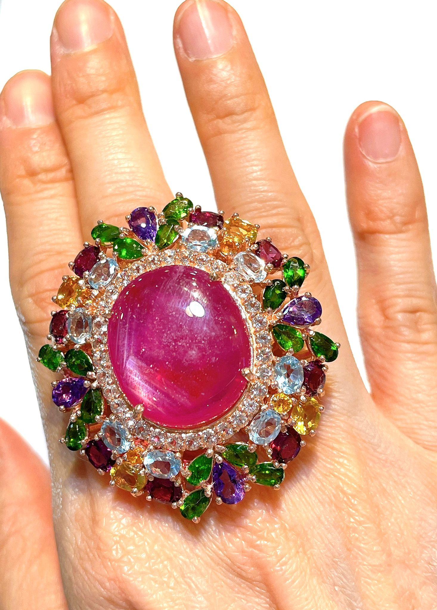 Bochic  “Flamenco”   Ruby & Fancy Multi Color Gems Cocktail Ring 18K Gold & Silver 

Cluster Multi Color Fancy Gems from Sri Lanka
Ruby - 12 Carat 
Amethyst - 3 Carat 
Peridot - 2 Carat 
Blue Topaz - 2 Carat 
Citrine 3 Carat
White Topaz - 1