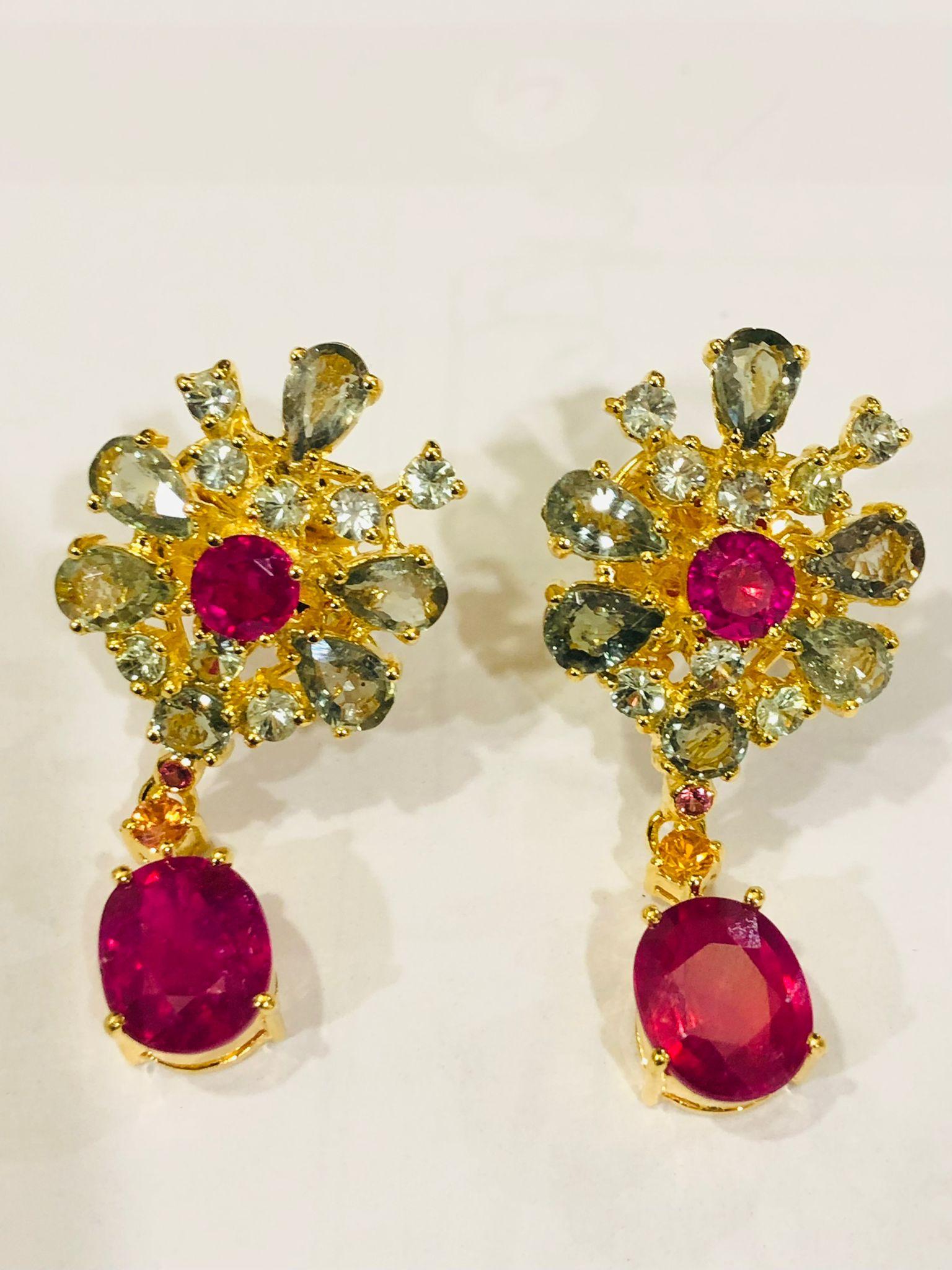 Bochic “Orient” Ruby, Yellow Sapphire & Emerald Earrings Set 18K Gold & Silver 

Centers - Natural Oval Shapes Rubies 
6.00 carat 
Natural Yellow Color Sapphires
3.00 carat 
Natural Green Sapphires 
6.00 carat

All Natural Sapphires from Sri Lanka