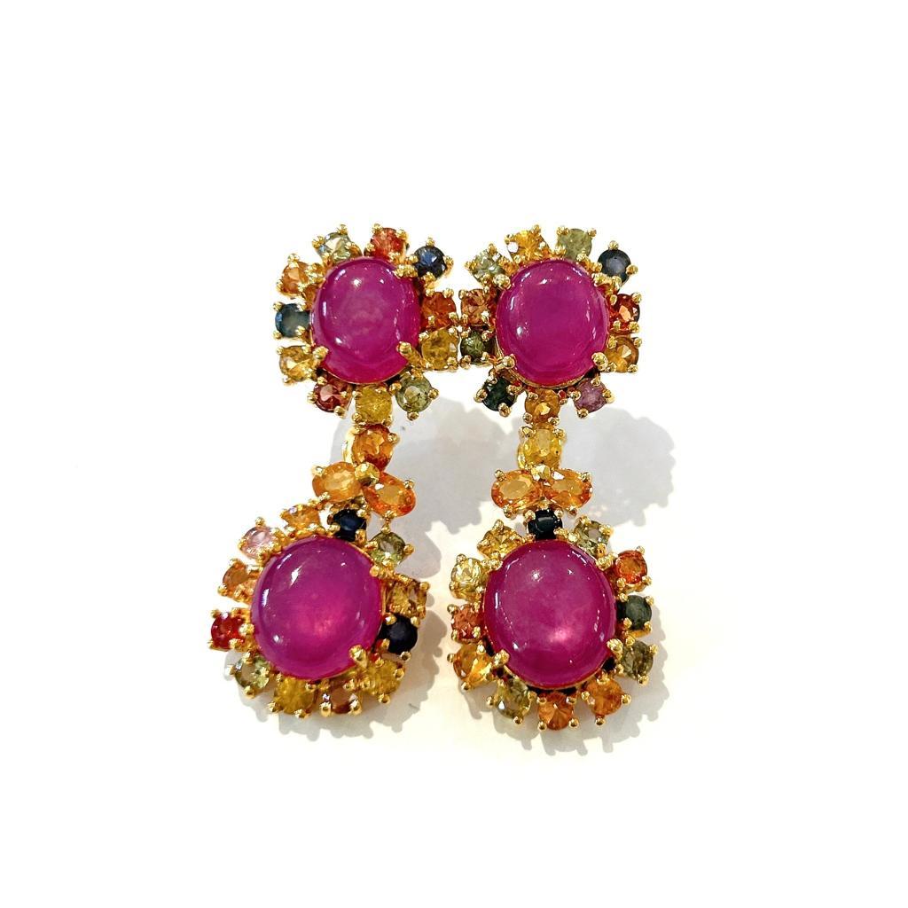 Bochic “Orient” Ruby & Multi Sapphire Earrings Set In 18K Gold & Silver 

Natural Ruby Oval Shapes - 17 Carats 
Multi Color Sapphires from Sri Lanka - 4.50 Carat 
Colors : Pink, Blue, Green, Yellow, Orange 

The earrings from the 