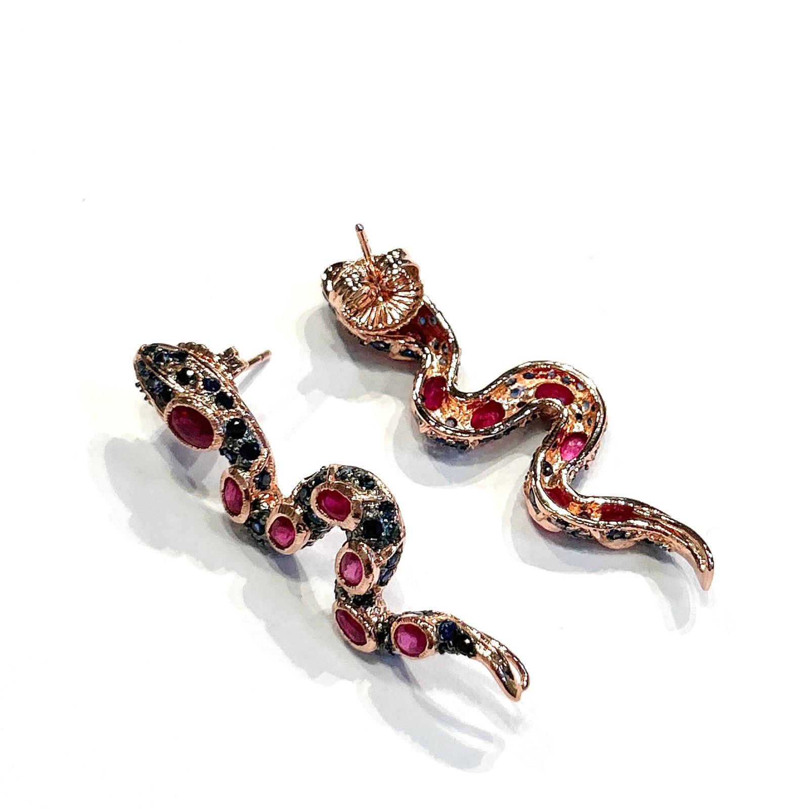 Bochic “Orient” Ruby & Multi Sapphire Serpent Earrings Set In 18K Gold & Silver 

Natural Rubies - 4 carat  
Natural Blue color Sapphires  - 2.50 carat 

The earrings from the 