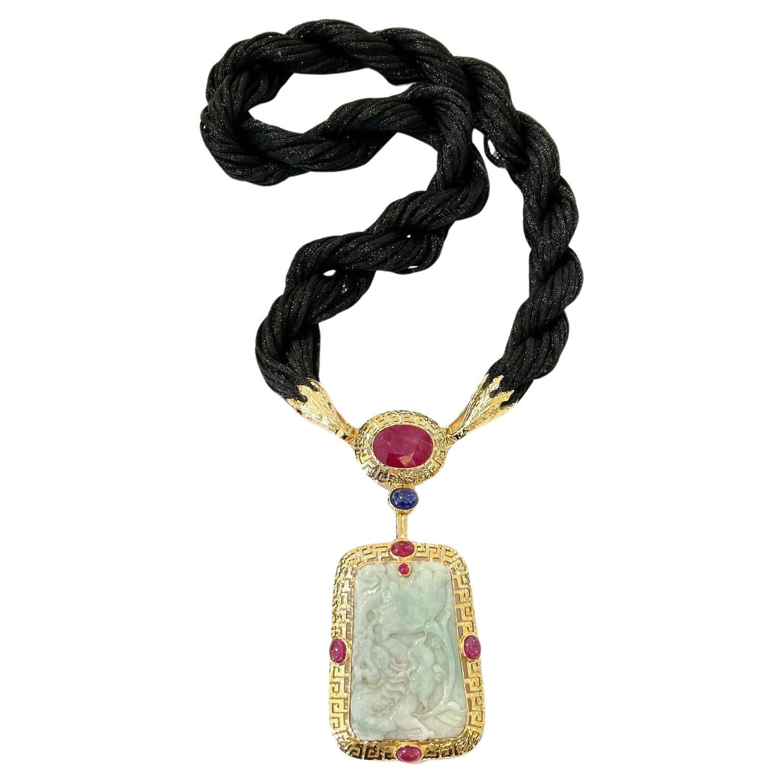 Bochic “Orient”  Ruby, Sapphires & Mint Vintage Jade Neck Set In 18 K Gold & Silver 

Natural oval Ruby - 42 carats 
Blue color sapphires - 5.00 carats 
Vintage Jade from China 
Mint green 

This Necklace is from the 
