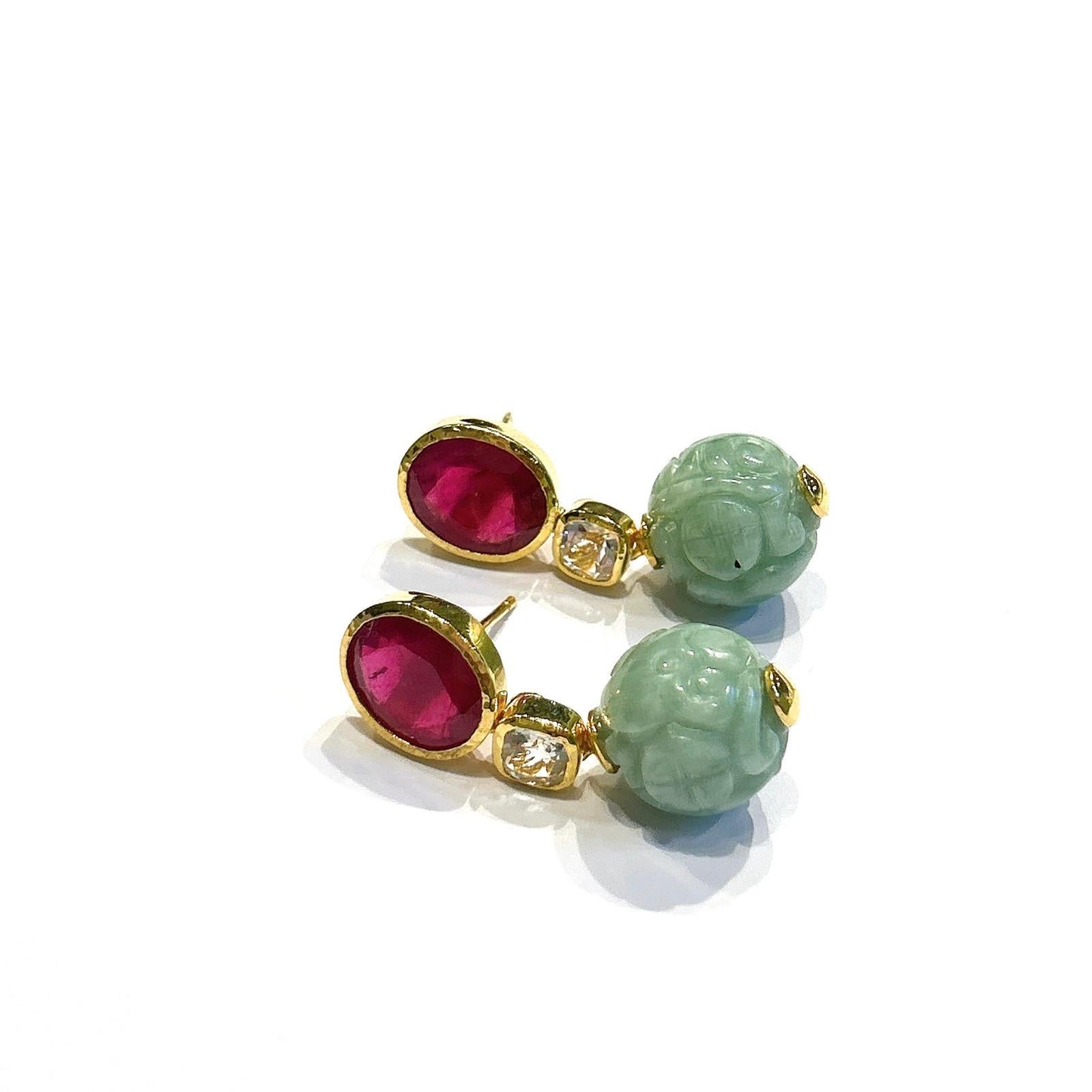Bochic “Orient” Ruby, Topaz & Vintage Jade Earrings set 18K Gold & Silver

Natural Rubies - 4 carats 
White Topaz - 1 carats 
Vintage Carved Mint Jade 

The earrings from the 