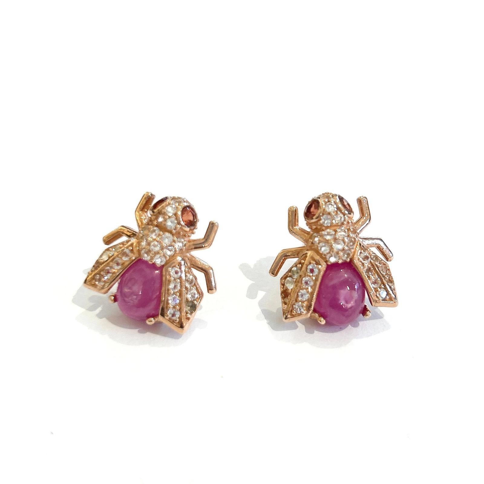 Bochic “Orient” Ruby & White Topaz Sapphires Set In 18K Gold & Silver Earrings

Natural Red Rubies Cabochons and Pear Shapes 
3 carats 
Natural Fancy color Multi Sapphires from Sri Lanka 
1 carats 

The earrings from the 