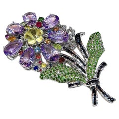 Bochic  Broche "Oriente" de zafiro, amatista y tsavorita engastado en oro de 18 quilates y plata