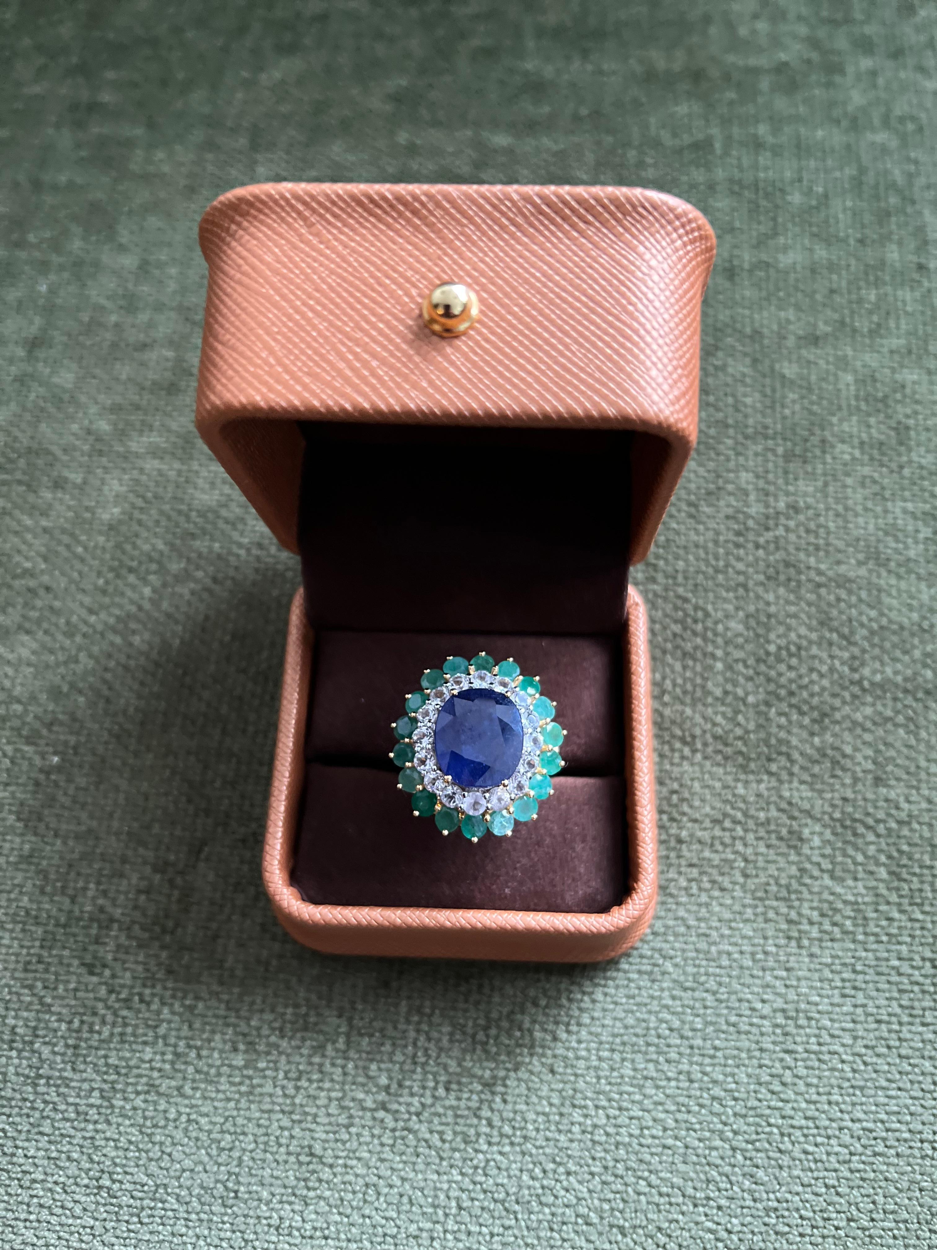 Bochic “Orient” Emerald, Sapphire & Topaz Ring Set In 18K Gold & Silver 

Natural Blue Sapphire from Sri Lanka, Oval Cut 
7 Carat 
Natural Green Emeralds from Zambia, Round Cut
2.50 Carat 
Natural Rose Cut White Topaz 
1.40 Carat 

This Ring is from