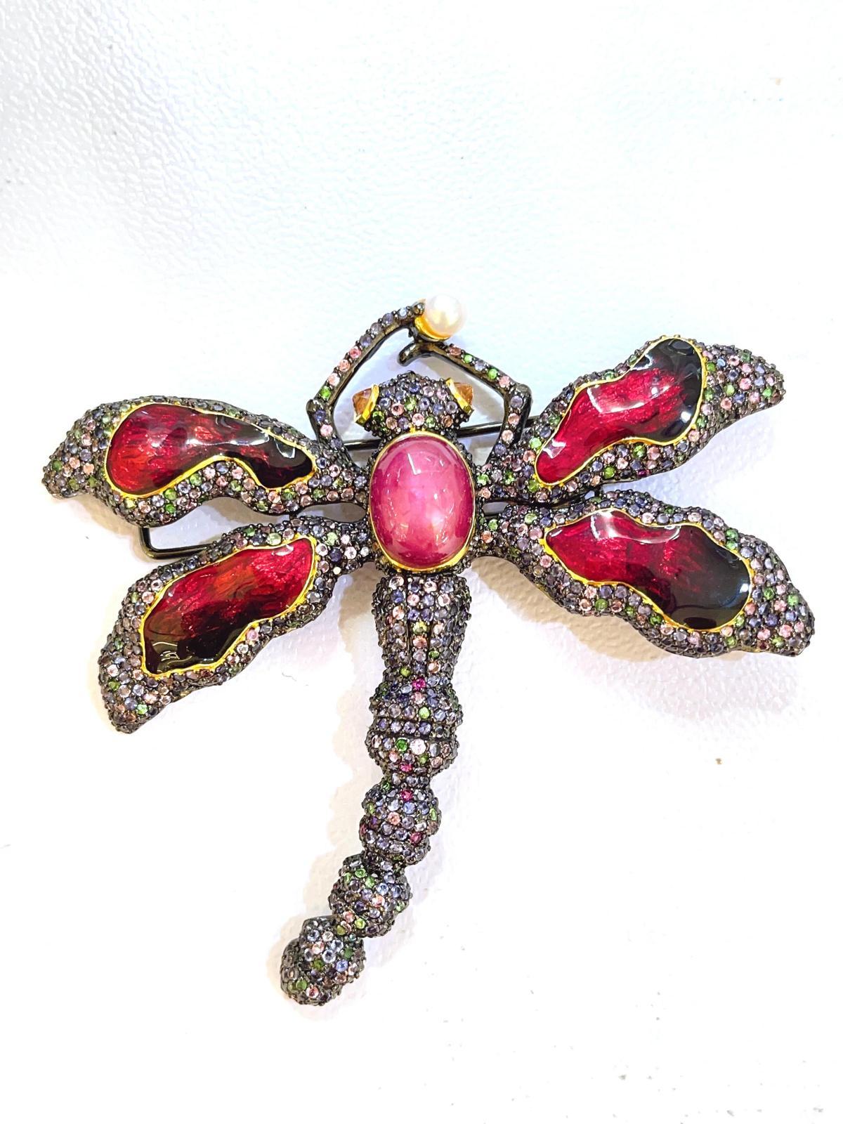 Bochic “Orient” Sapphire, Red Ruby & Red Enamel Brooch Set In 18K Gold & Silver 
Fancy Multi color Sapphire from Sri Lanka - 7 Carats 
Red Ruby Cabochons - 10 Carats 
Red Enamel and Pearl
The Bochic 