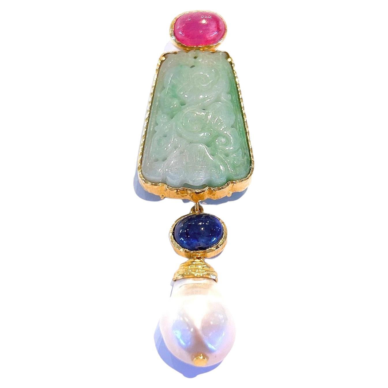 Bochic “Orient’ South Sea Pearl, Sapphire & Jade Pendant Set 18K Gold & Silver
South Sea Natural White Pearls with Pink & Silver tones 
Natural Blue Sapphire from Sri Lanka 
8 carats 
Cabochon Shapes and Round Brilliant Shapes 
Green Carved Vintage
