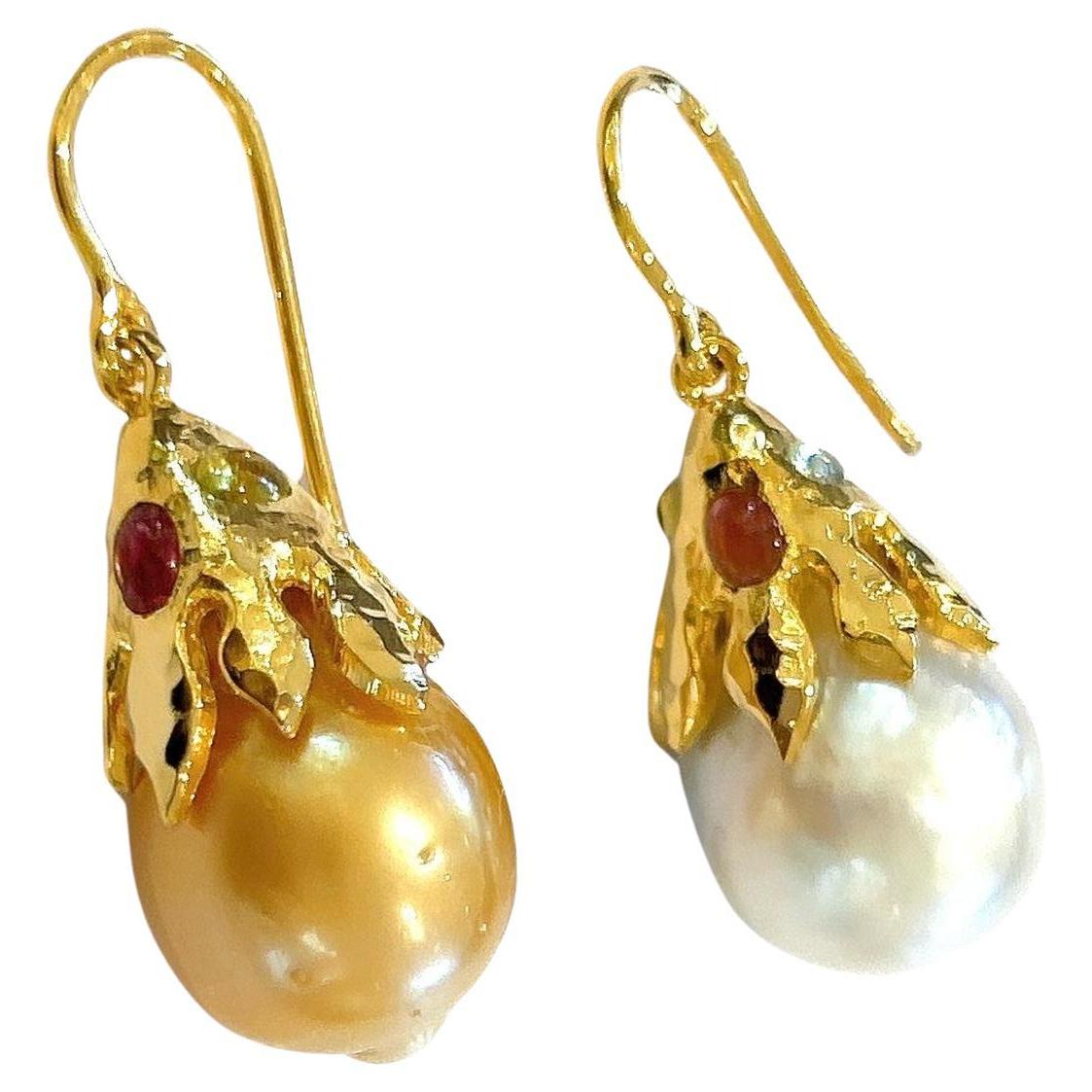 Bochic “Orient” South Sea Pearl & Tourmaline Earrings Set In 18K Gold & Silver 

South Sea Pearl in Golden and White colors 
Drop shape 

Multi Color Tourmalines - 2 Carats

The earrings from the 