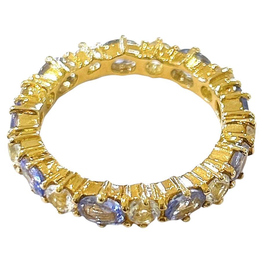 Bochic “Orient” Tanzanite & White Topaz Eternity Band Ring 18K Gold & Silver 

Tanzanite and White Topaz - 3 Carat 

This Ring is from the 