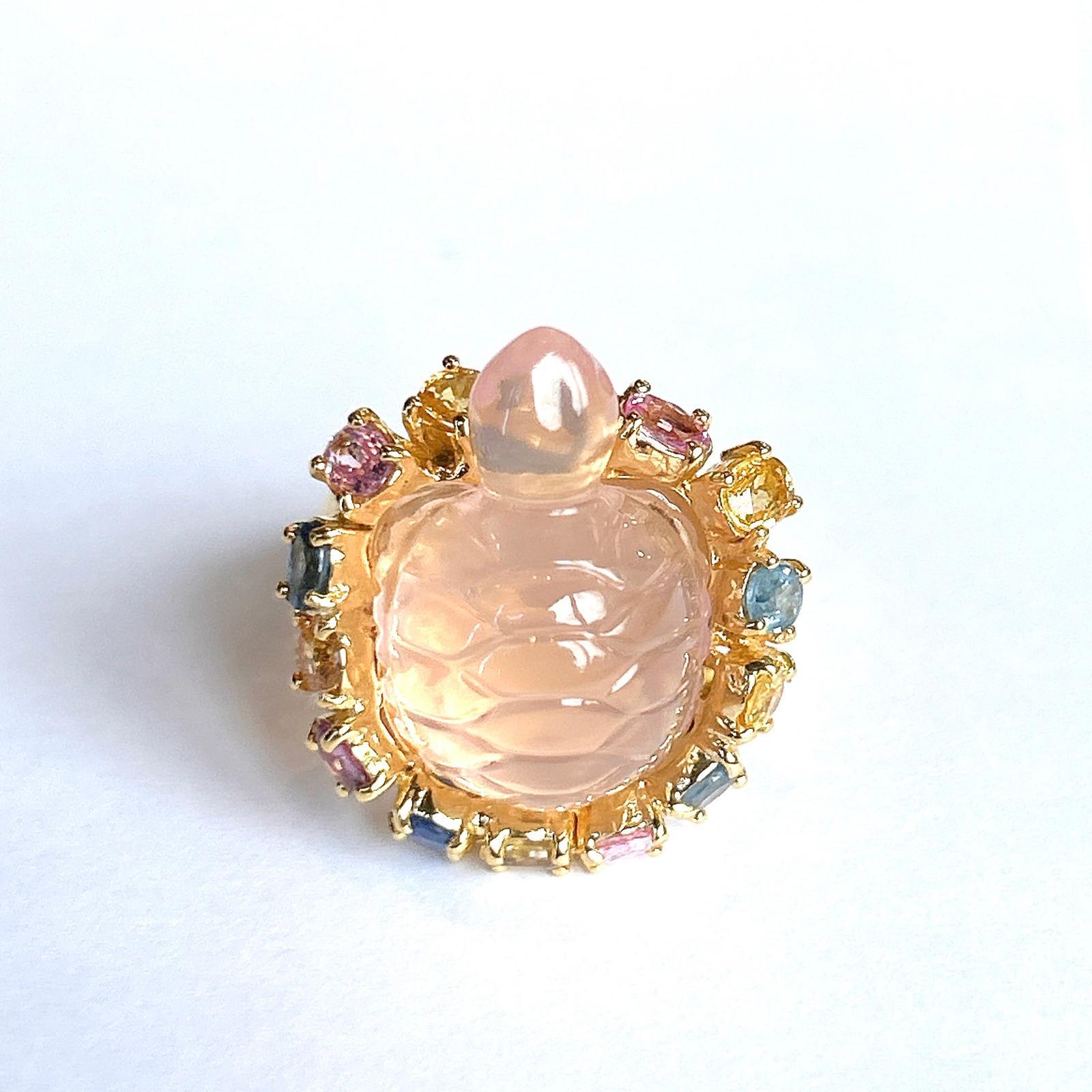 Bochic “Orient” Turtle Rose Quartz & Sapphires Ring Set In 18K Gold & Silver 

Rose Quartz - 11 Carats 

Cluster Multi Color Fancy Sapphires from Sri Lanka
Sapphire colors 
Pink, Yellow, Green, Light Blue, Orange, Lilac 
7 Carats 

This Ring is from