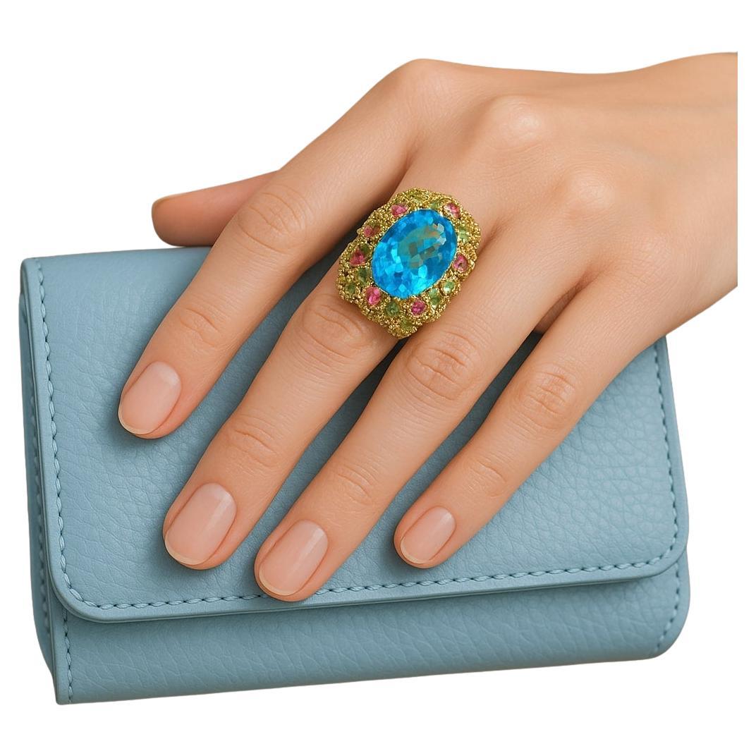 Anello Vintage "Orient" con Topazio Blu e Rodorite in oro e argento 18 carati