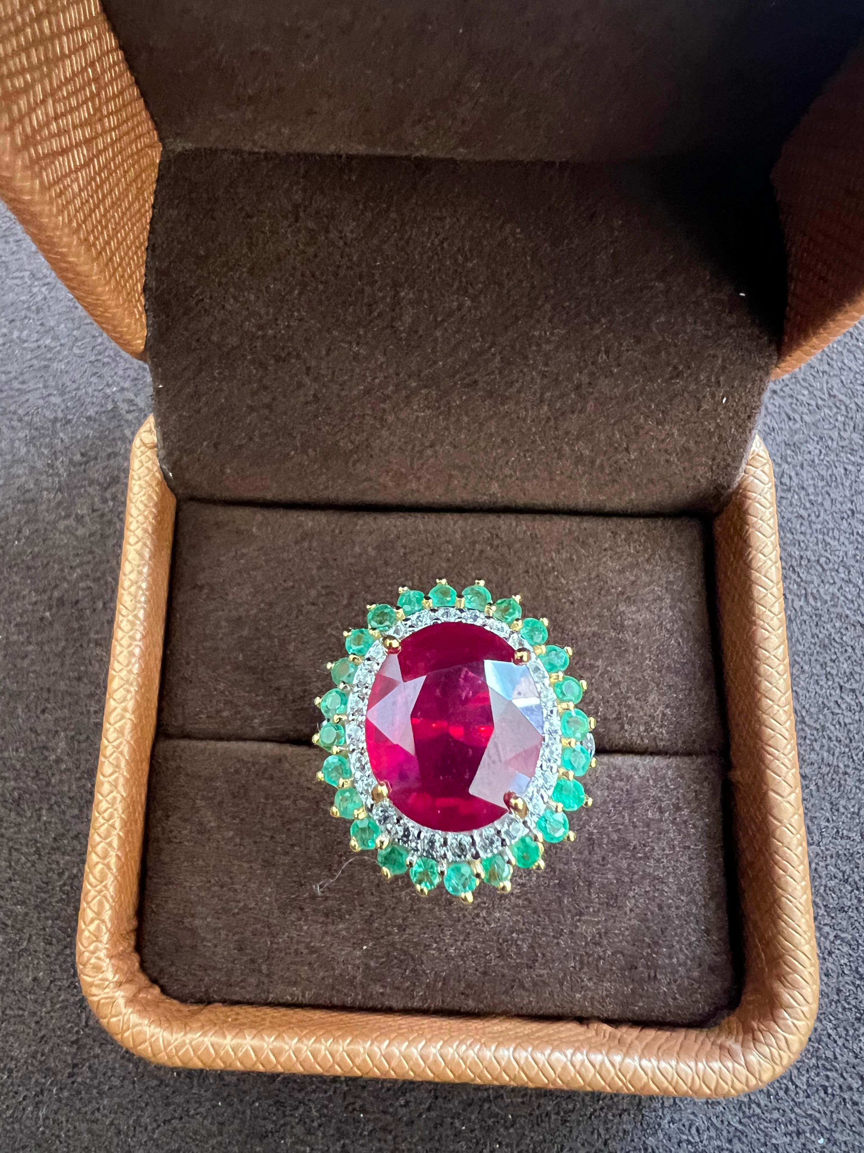 Bochic “Orient” Vintage Diamond, Ruby & Emerald Ring Set In 18K Gold & Silver

Natural Center Oval Shape Ruby
8.00 Carat 
Natural Emeralds
2.00 Carats 
Natural Single Cut Diamonds 
1.00 Carats 

This Ring is from the 