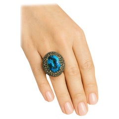 Anello vintage con diamanti grigi e topazio blu di Bochic "Orient", incastonato in oro e argento 18 carati