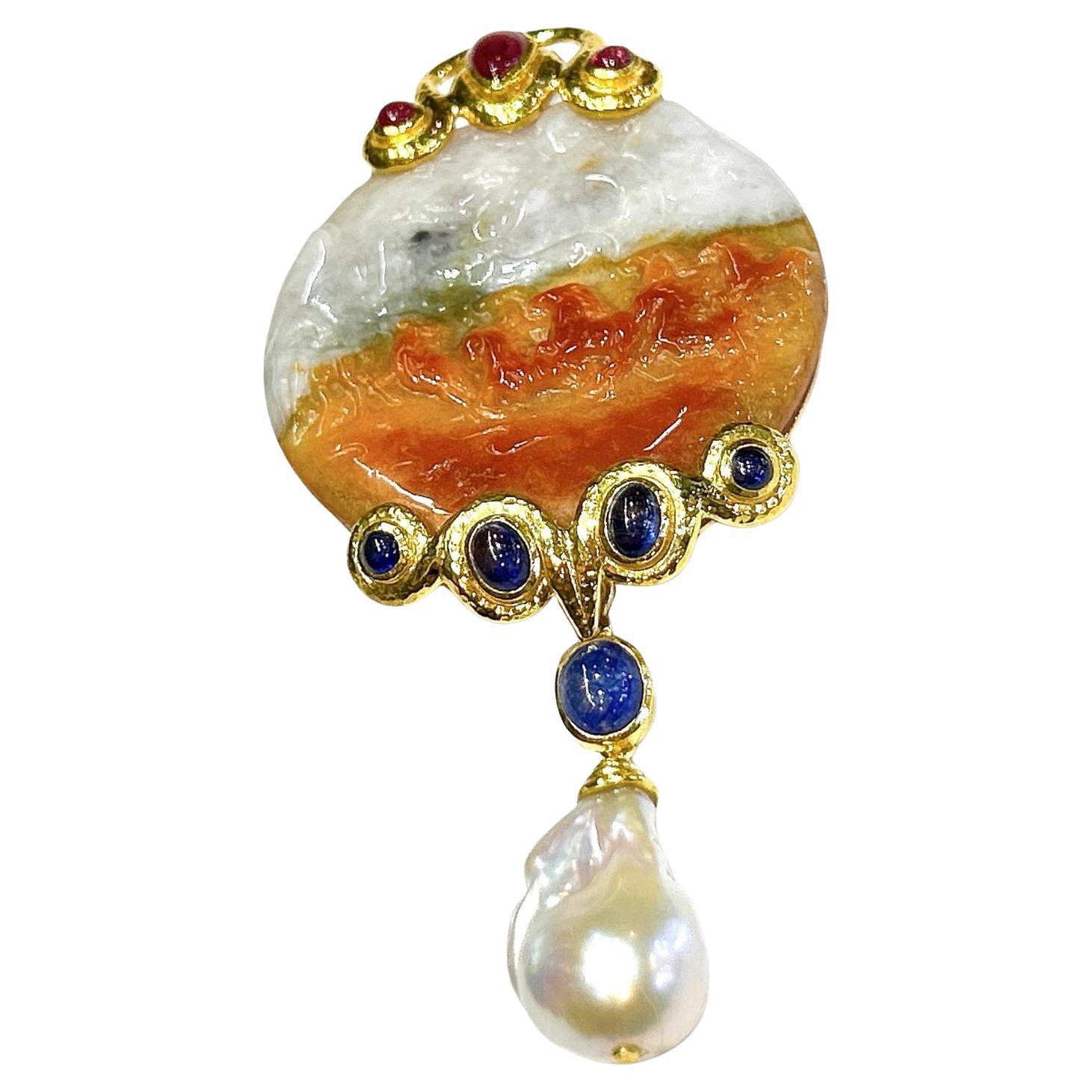 Bochic “Orient” Vintage Jade & Blue Sapphire Large Brooch / Pendant Set In 18K Gold & Silver 
Can be worn as a brooch and a pendant 

Natural Blue Sapphire  - 3 carat 
Natural Red Ruby - 1 carat 
Vintage jade 

The Brooch is from the 