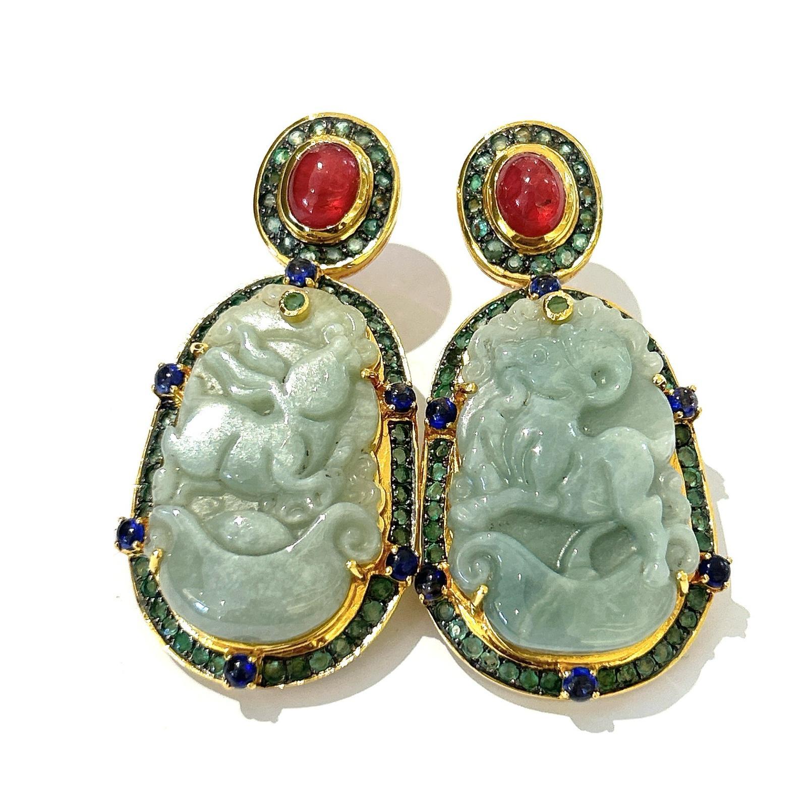 Bochic “Orient” Vintage Jade, Ruby, Emerald & Sapphire Earrings Set In 18k Gold and Silver 

Natural oval cut cabochons - 3 carats 
Natural Emeralds - 2 carats 
Natural blue sapphires - 1 carat 


The earrings from the 