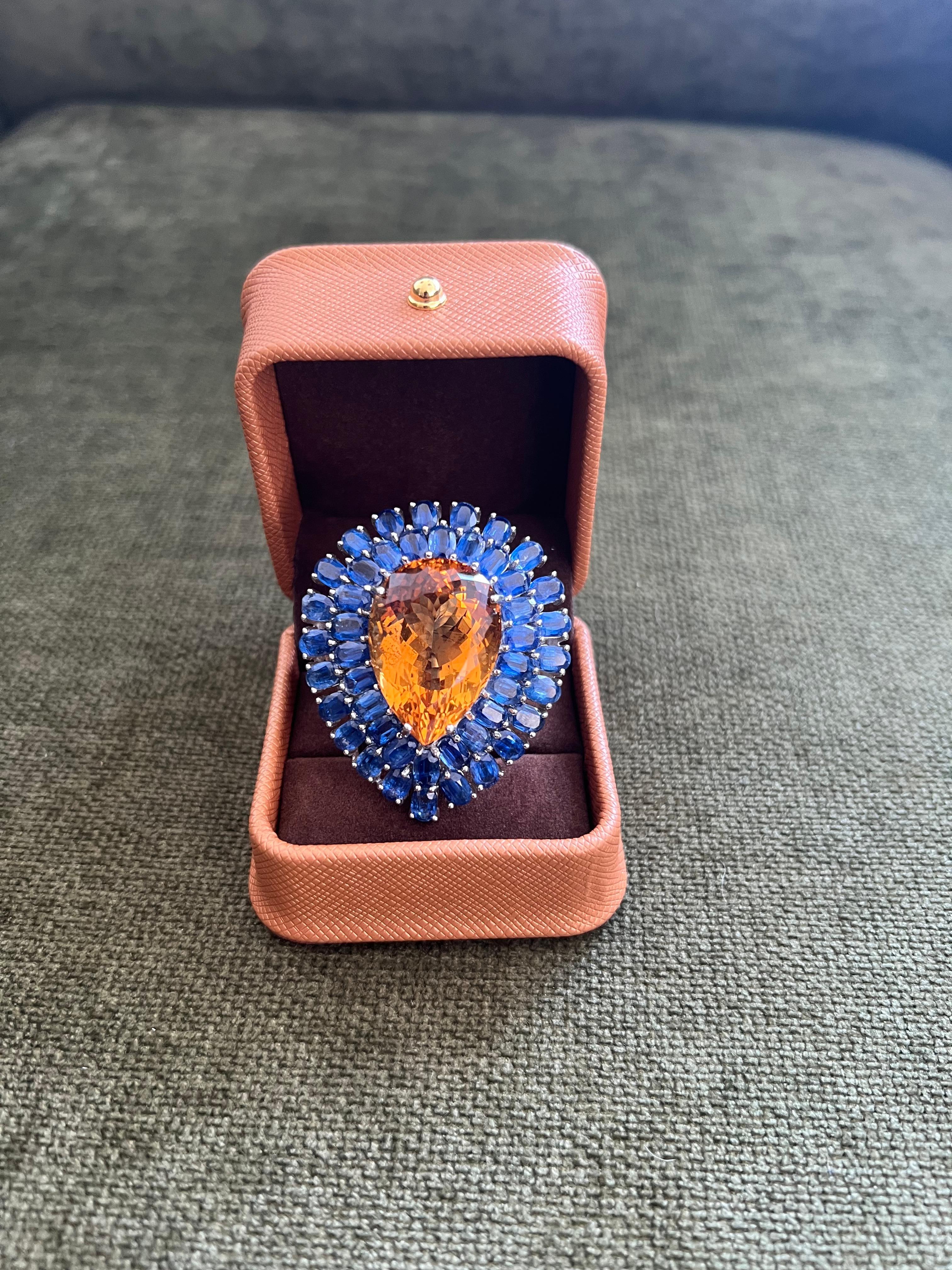 Bochic “Orient” Vintage Natural Kyanite and Citrine Ring Set In 18K White Gold & Silver

Natural Pear Shape Orange Citrin
17.50 Carat 
Natural Round Brilliant Blue Kyanite 
15.00 Carat 

This Ring is from the 