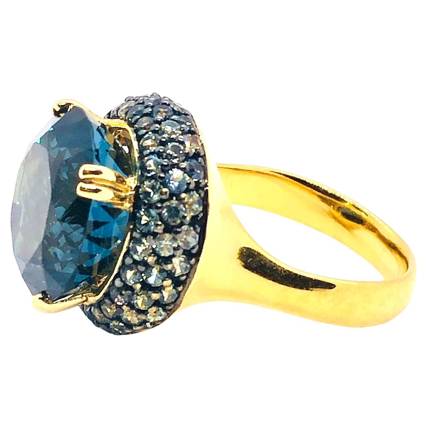 Bochic “Orient” Vintage Natural London Blue Topaz & White Sapphire Ring Set 18K & Silver

Natural London Blue Topaz - 14 carat 
Natural White Sapphire - 2 carat

This Ring is from the 