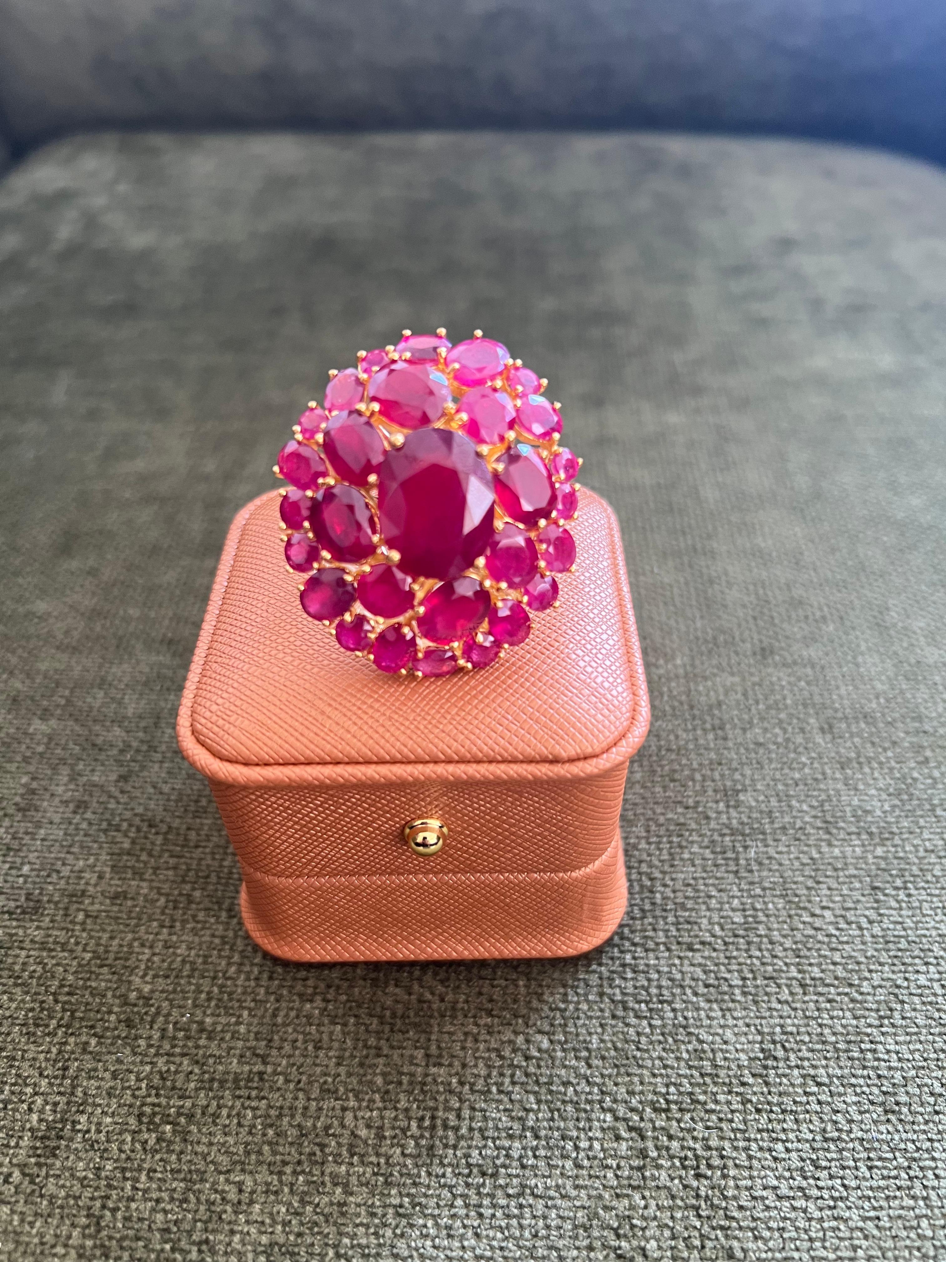 Bochic “Orient” Vintage Natural Ruby Cocktail Ring Set In 18K Gold with Certificate

Natural Center Ruby - 10.00 Carat 
Natural Round Brilliant Rubies Cluster - 30.00 Carat 

This Ring is from the 