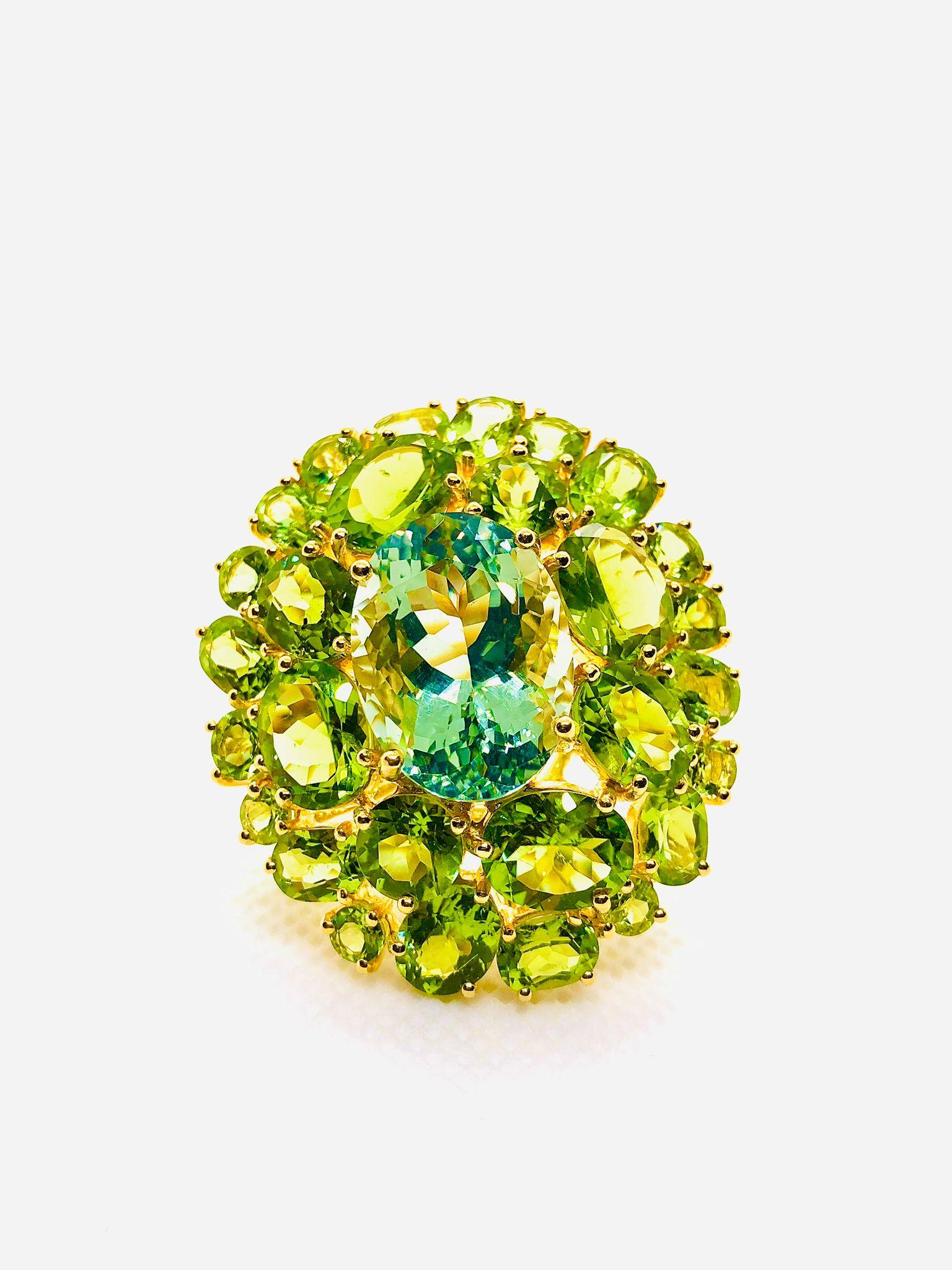 Bochic “Orient” Vintage Peridot & Green Amethyst Ring Set In 18K Gold & Silver 

Natural Peridot and Green Amethyst
16 Carat 

This Ring is from the 
