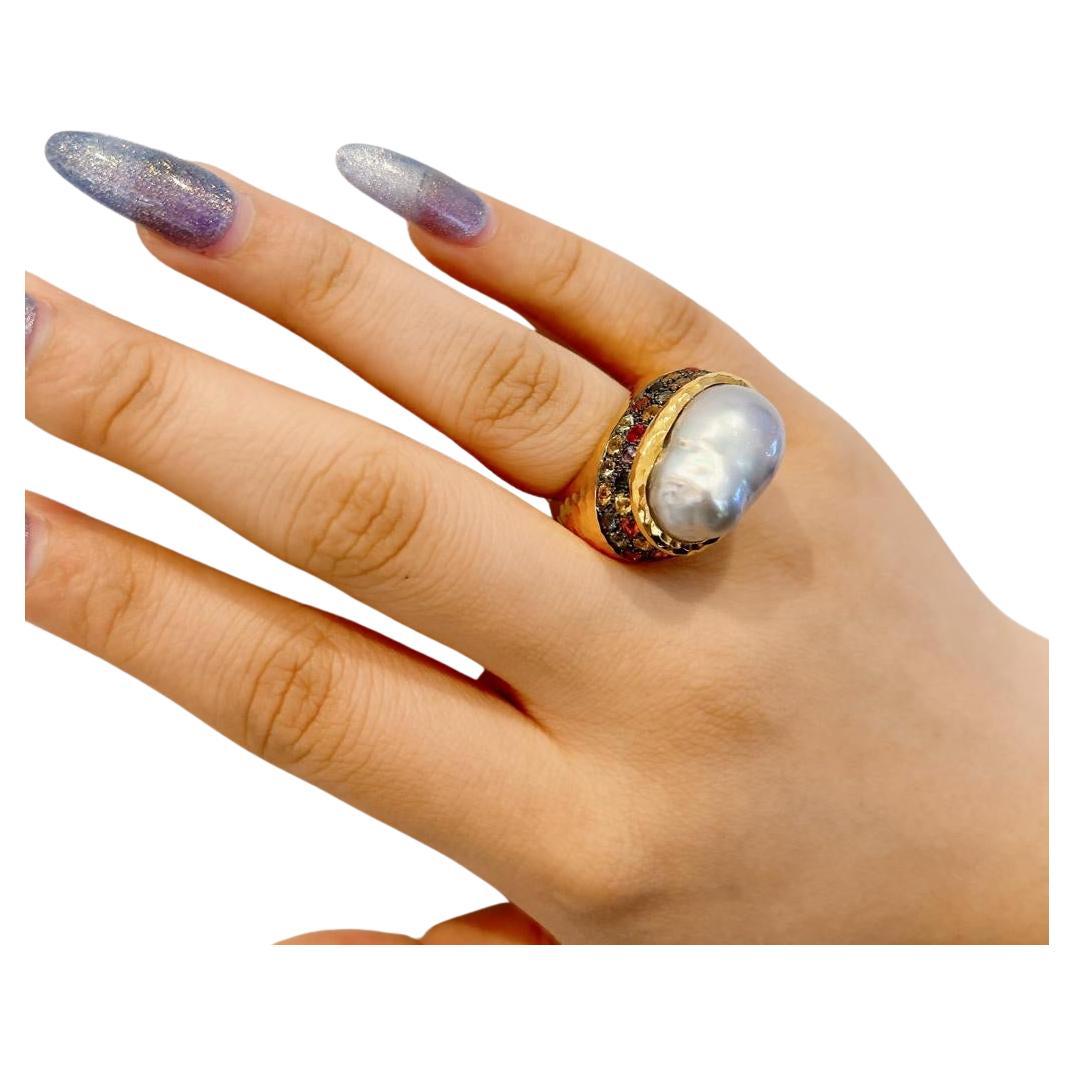 Bochic “Orient” Vintage Retro Pearl & Multi Sapphire Ring Set 18K Gold & Silver

Natural Multi Color Sapphire from Sri Lanka 
1.20 carat 

This Ring is from the 