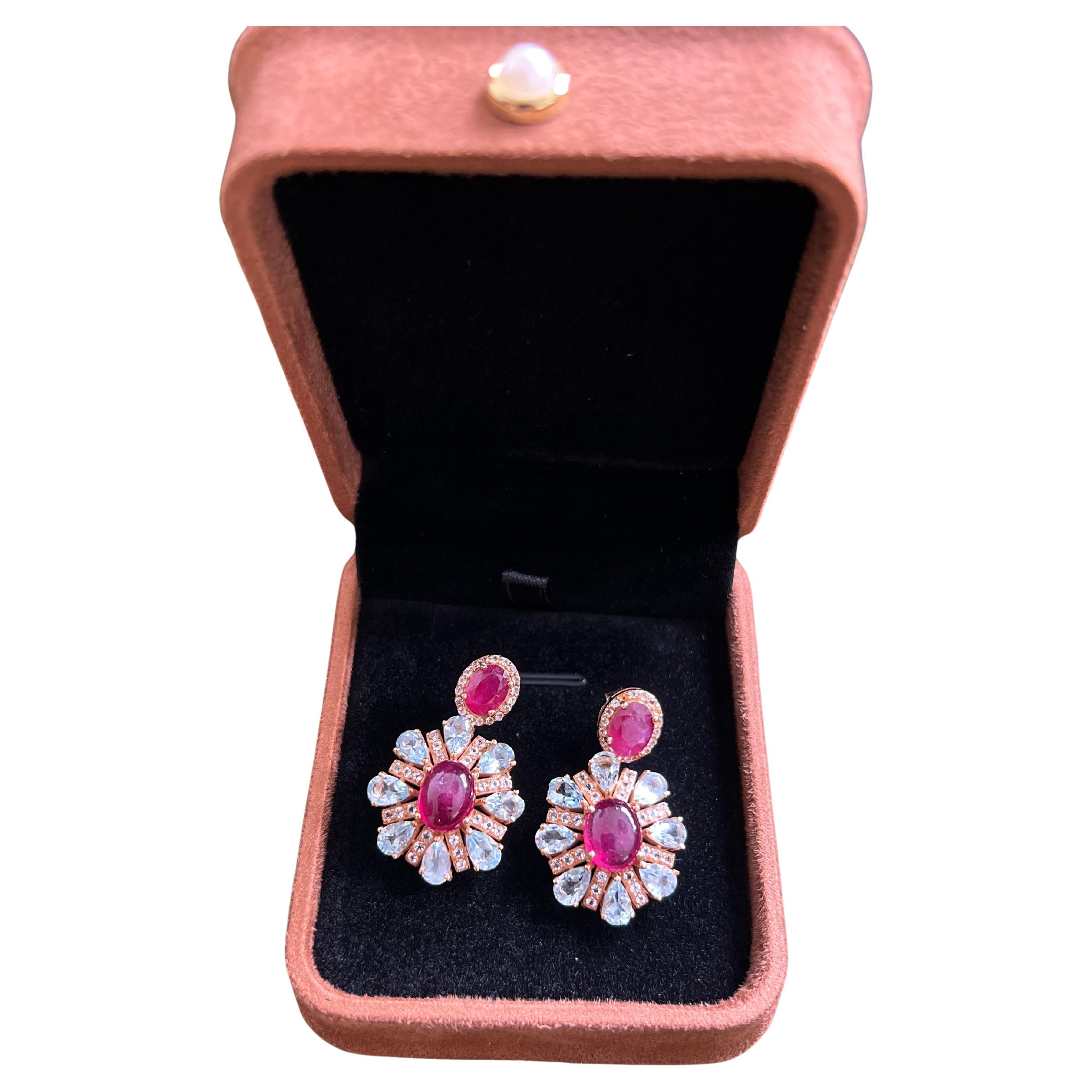 Bochic “Orient” Vintage Ruby, Diamonds & Topaz Earrings Set 18K Gold & Silver

Natural Ruby 
9 carats 
Natural Blue Topaz 
6 carats 
Natural Diamonds
2 Carats 
The earrings from the 