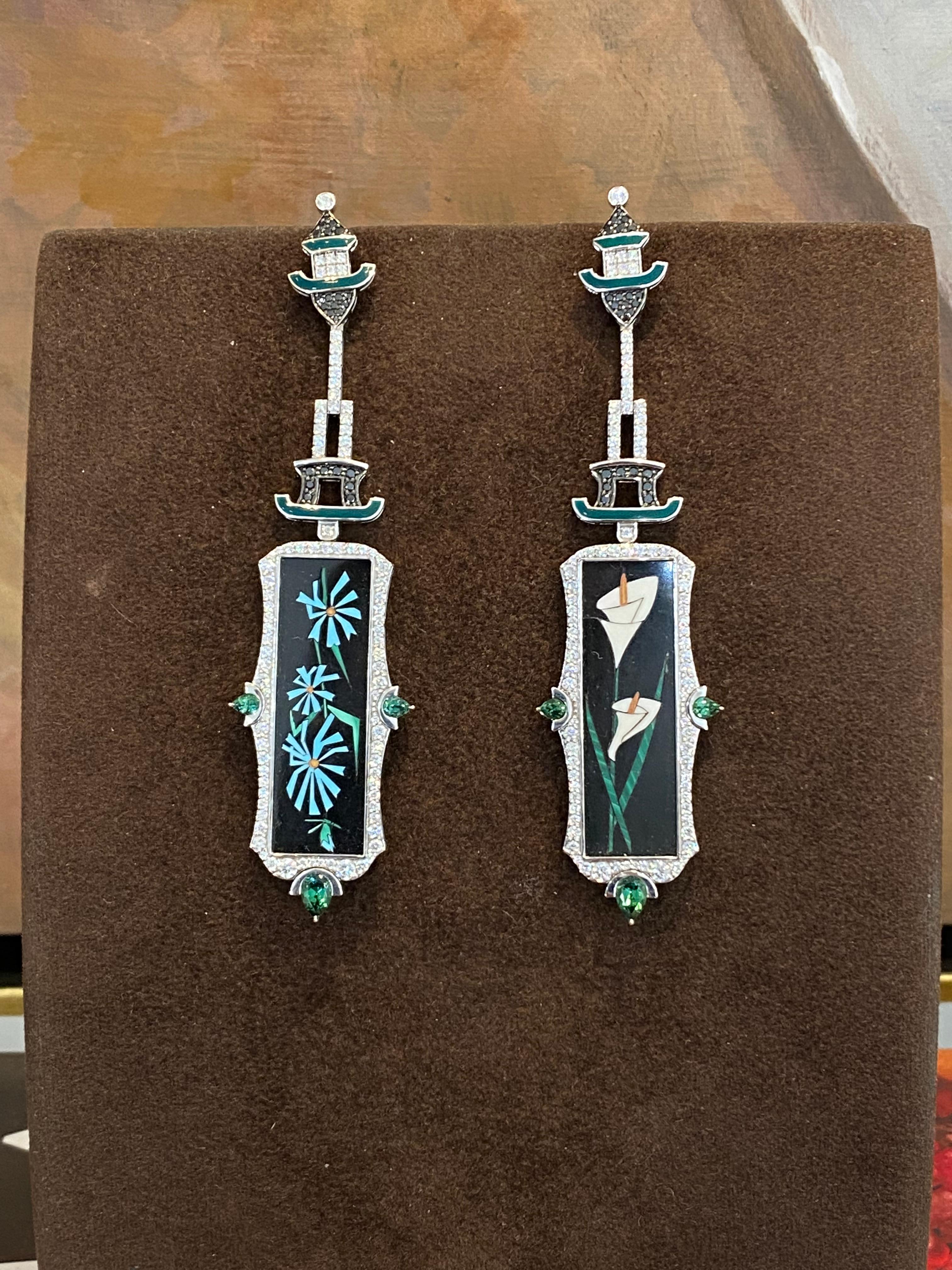 Bochic Exquisite and bold Mosaic Bird earrings shimmer with 18k Gold, White and Black Diamonds.
The Mosaic flower center piece is a work of art made from gem stones like, black onyx, agate, jade turquoise and more. 

48 Diamonds 0.50 Carat 
178
