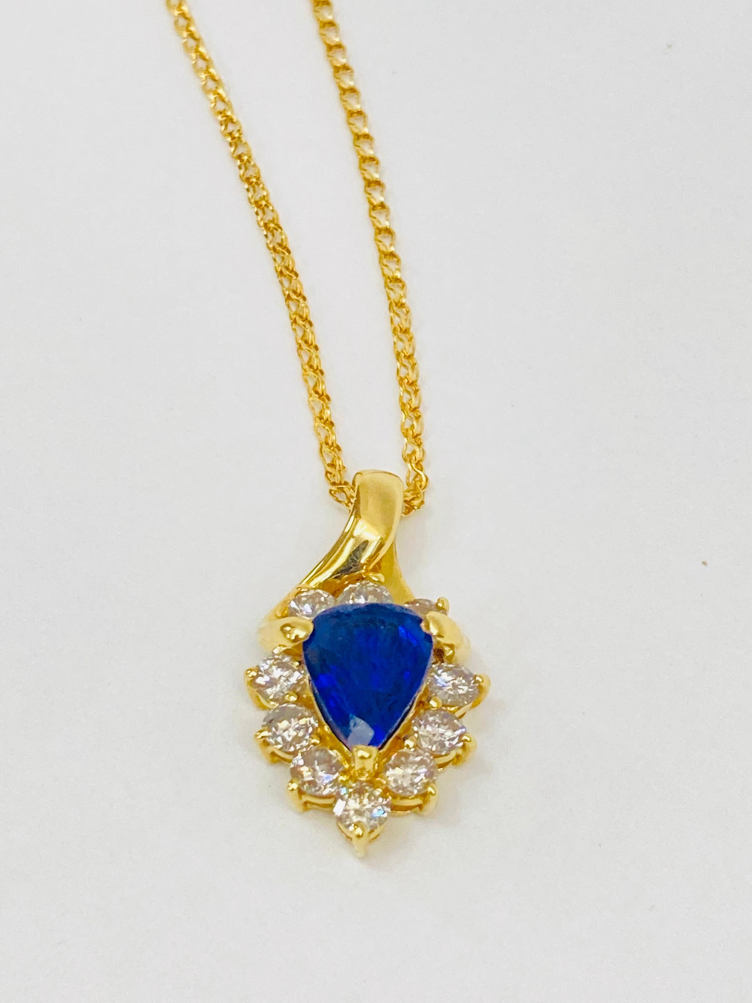 Bochic “Retro Vintage” Blue Sapphire  & Diamond Cluster Neck Set In 18K Gold 

Natural Blue Sapphire Pear Shape 1.03 Carat 
From Sri Lanka 
Diamonds 0.55 Carat 
F color 
VS clarity 
18K Yellow Gold
5.10 Gram

This Necklace is from the 
