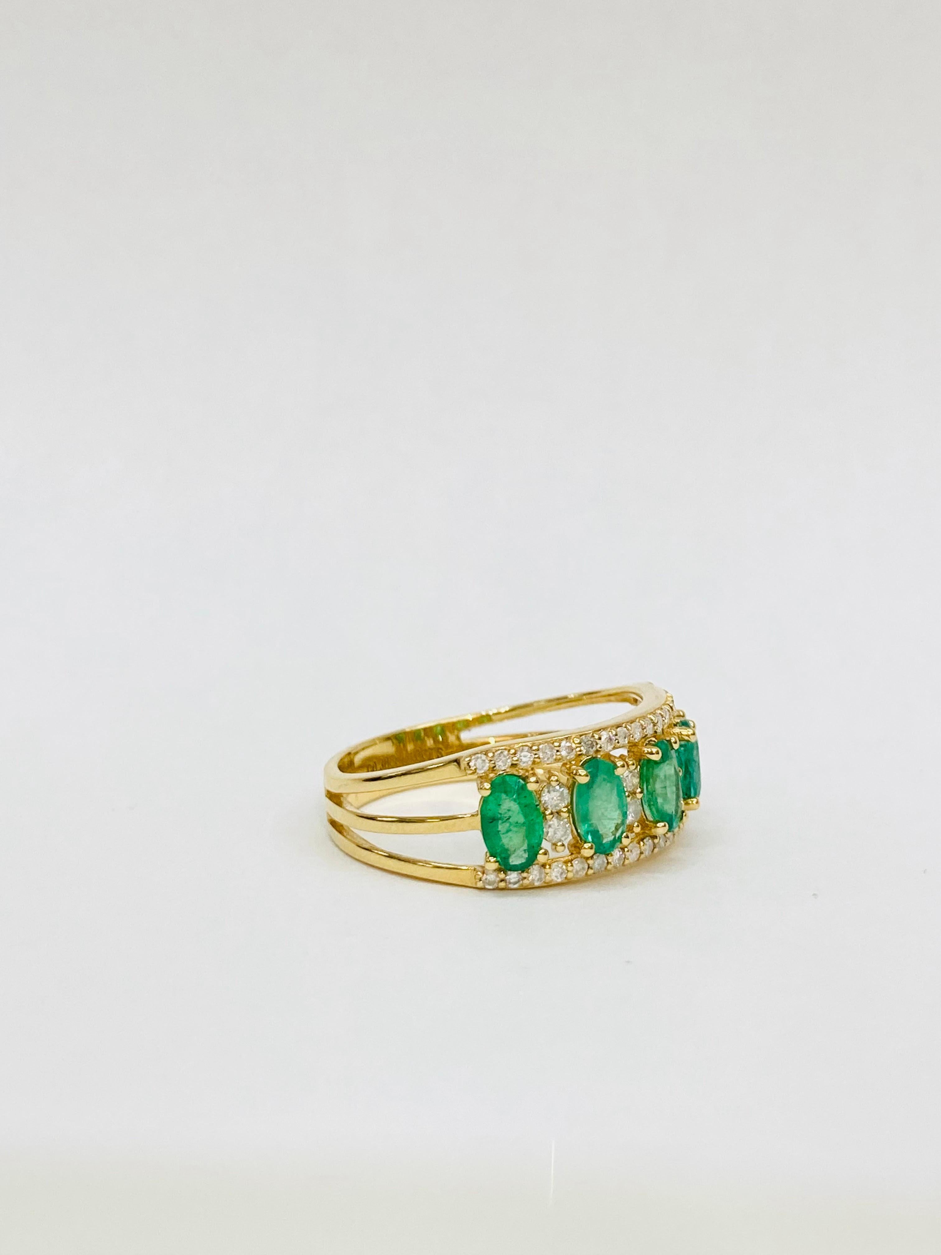 Bochic “Retro Vintage” Emerald  & Diamond  18K Gold & Eternity Cluster Ring.
Natural Green Emerald  from Zambia 1.40 Carat 
Oval Shapes 
Diamonds 0.35 Carat 
Round Brilliant
F color 
VS clarity 
18K Yellow Gold
3.50 Gram

This Ring is from the