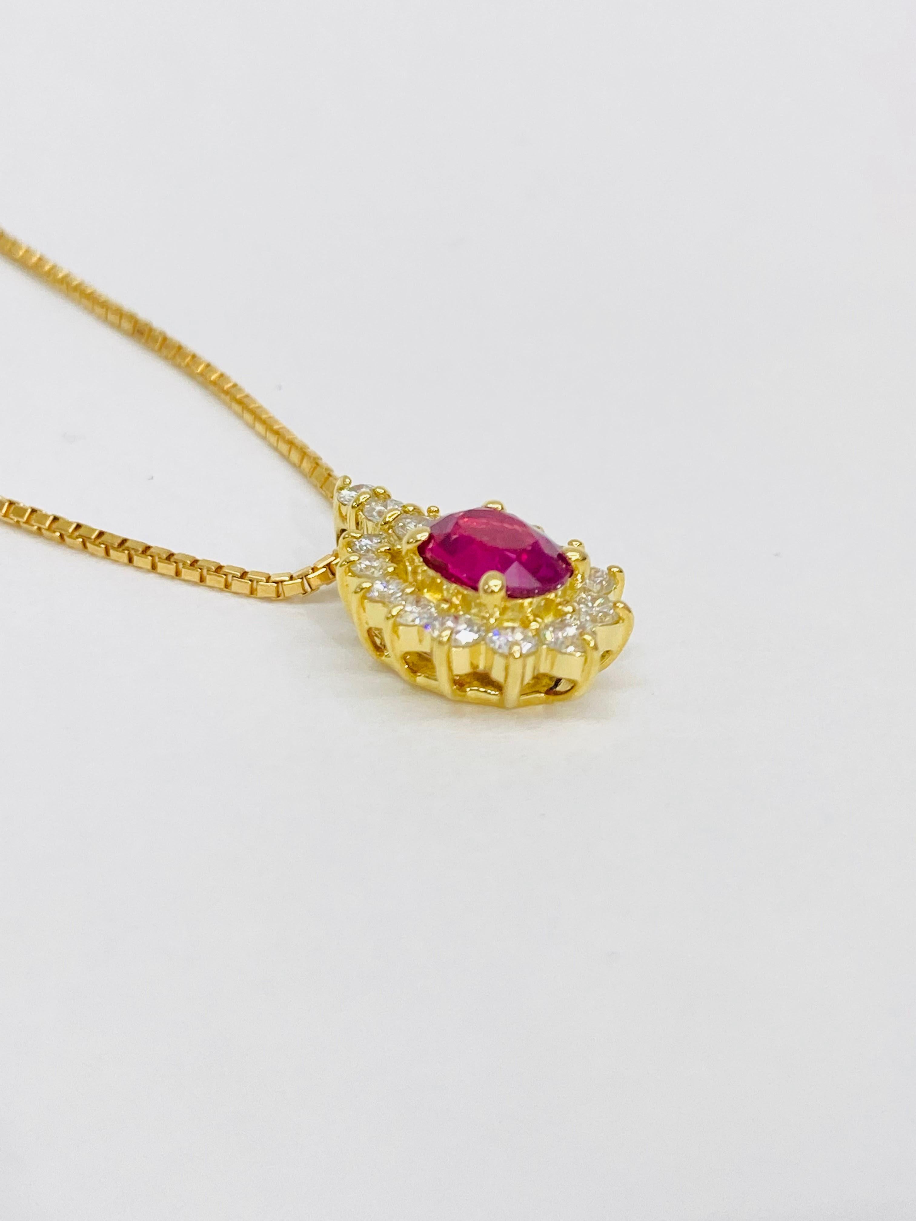 Bochic “Retro Vintage” Ruby & Diamond Cluster Neck Set In 18K Gold 

Natural Red Ruby Pear Shape 0.85 Carat 
Diamonds 0.45 Carat 
F color 
VS clarity 
18K Yellow Gold
5.10 Gram

This Necklace is from the 