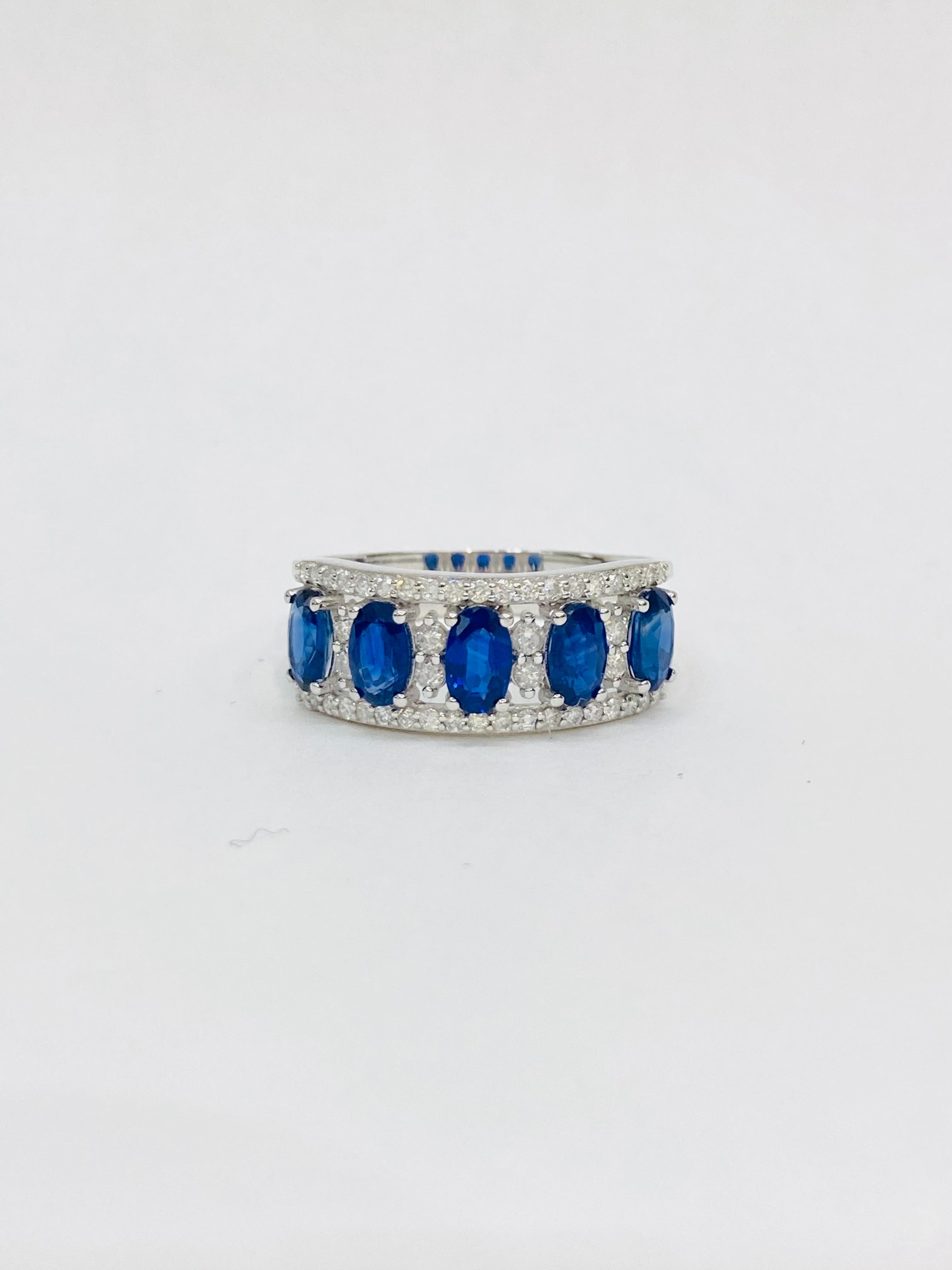 Bochic “Retro Vintage” Sapphire & Diamond  18K Gold & Eternity Cluster Ring.
Natural Blue Sapphire from Sri Lanka  1.60 Carat 
Oval Shapes 
Diamonds 0.35 Carat 
Round Brilliant
F color 
VS clarity 
18K White Gold
3.50 Gram

This Ring is from the