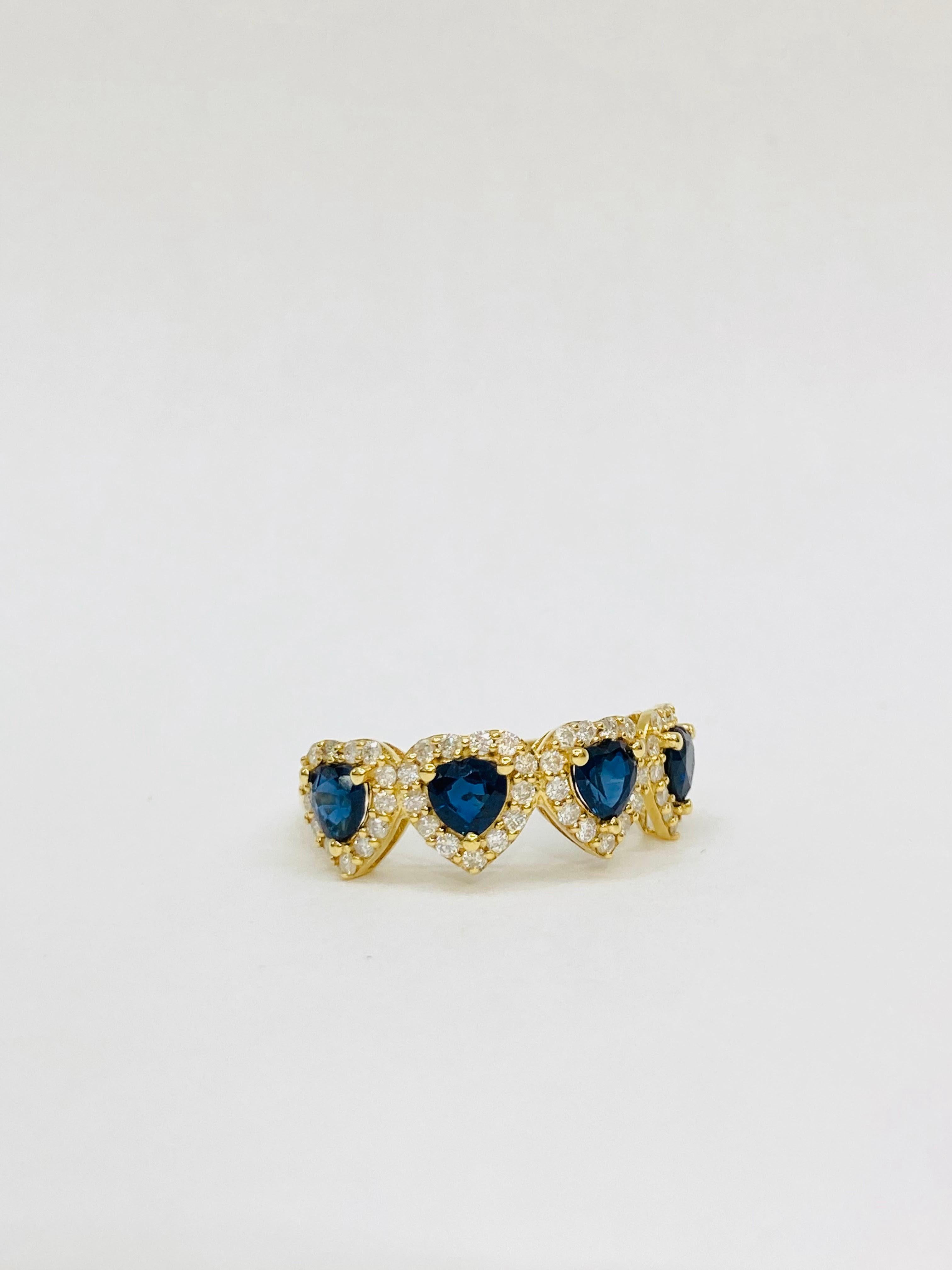 Bochic “Retro Vintage” Sapphire & Diamond  18K Gold & Eternity Cluster Ring.
Natural Blue Sapphire from Sri Lanka  2,00 Carat 
Heart Shapes 
Diamonds 0.45 Carat 
Round Brilliant
F color 
VS clarity 
18K Yellow Gold
3.00 Gram

This Ring is from the