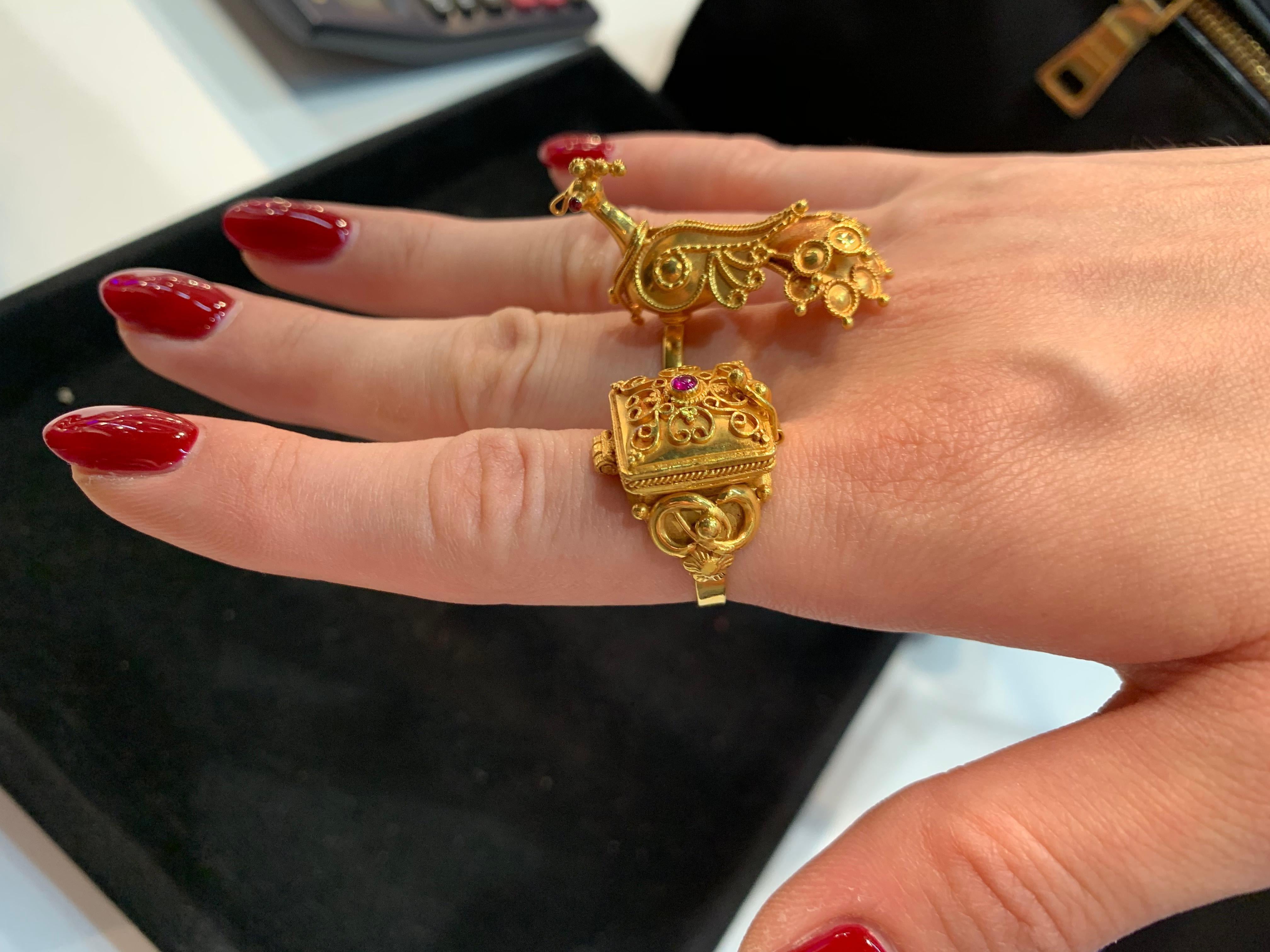 Bochic Vintage Gold Poison ring and Bochic vintage peacock ring. 
It’s chic and its functional.
Size can me made to fit. 
There are lots of names for poison rings – secret, pillbox, compartment, locket or vessel rings – but historically they all