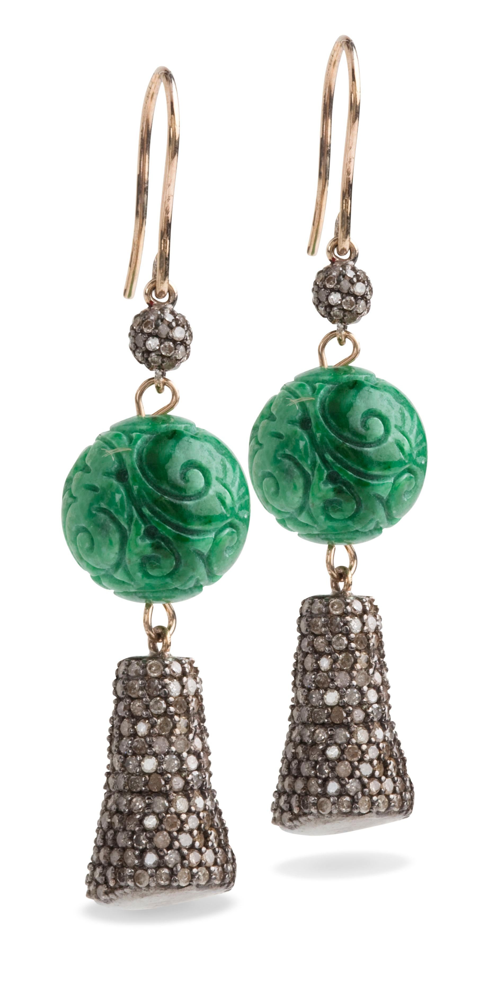 Bochic Vintage Green jade and diamond earrings 
Beautiful Jade carved antique balls 13MM
18K Black Gold 
White and Gray diamonds 
French hooks 
The earrings are light and are around 2 inch length 
Signed Bochic 
750 Gold 
Comes with a Bochic pouch 