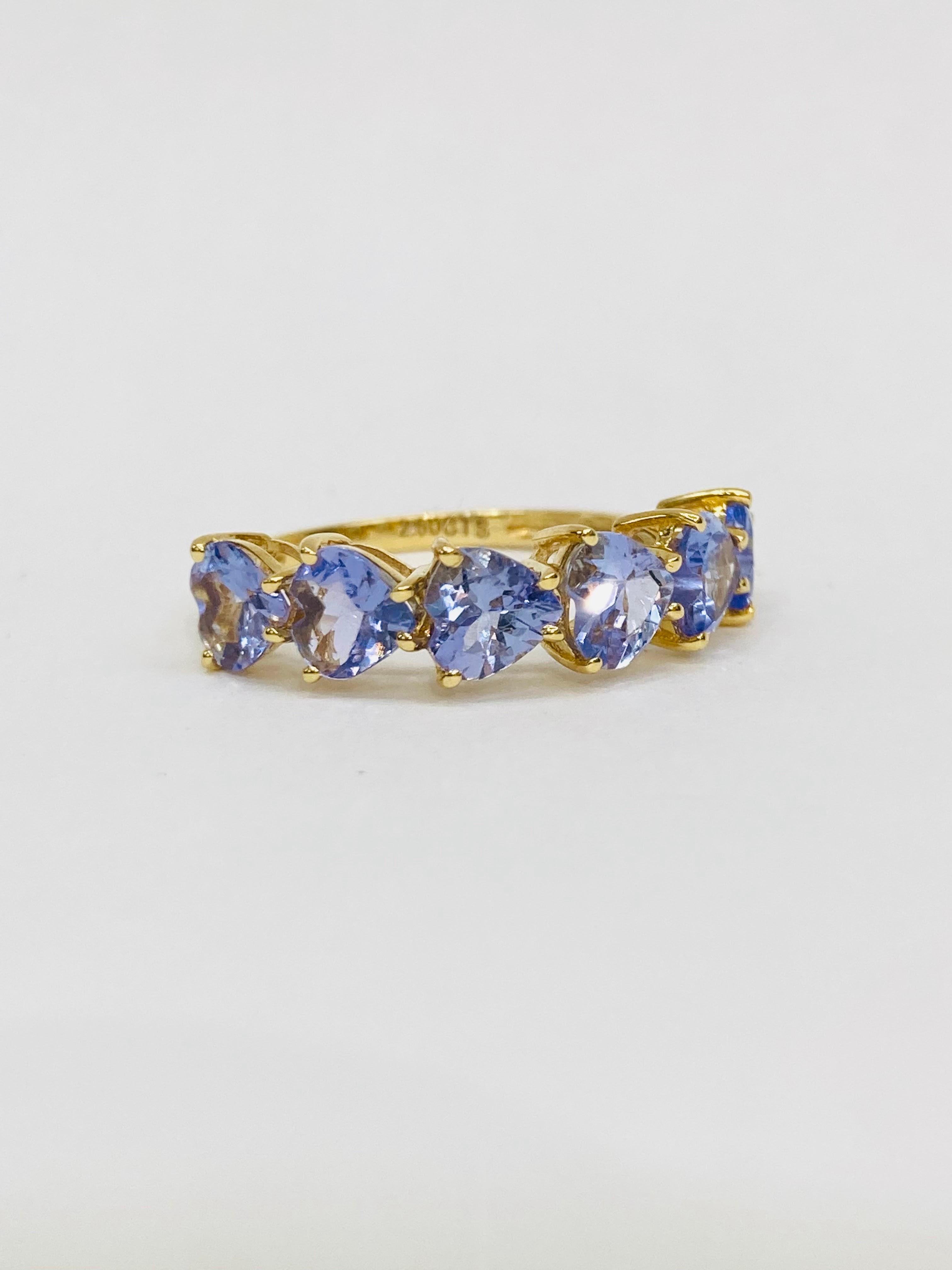 Bochic “Vintage Retro” Eternity 18K Gold Rind, Heart Shape Purple Tanzanite

Natural Tanzanite Heart Shape Gems from Tanzania 
2.50 Carat 
Yellow Gold 

This Ring is from the 